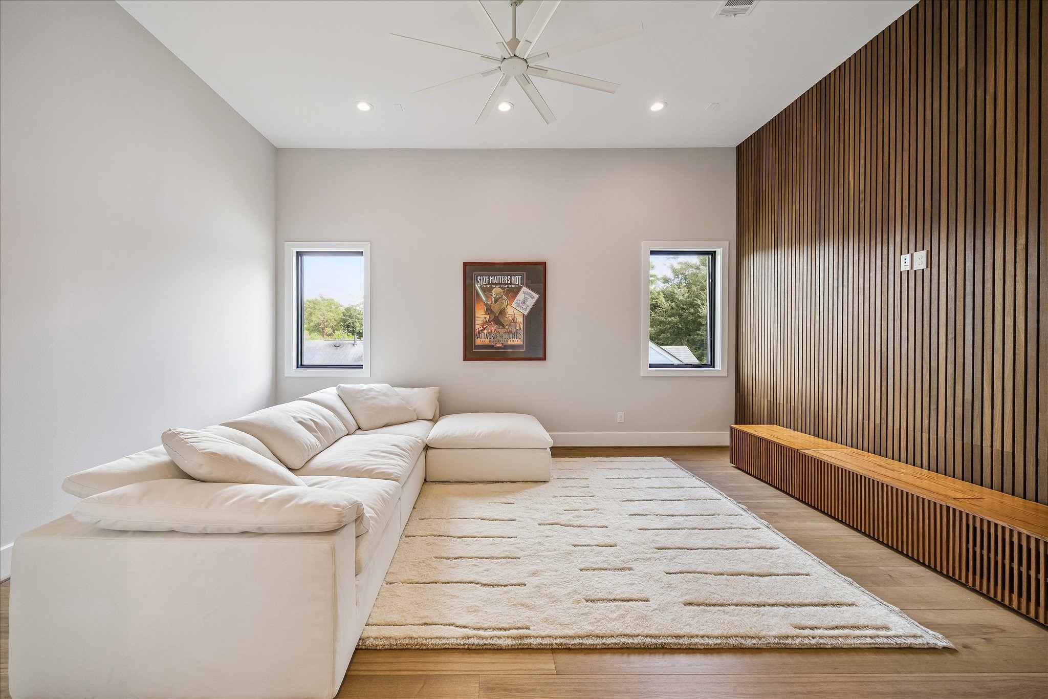 The second floor boasts a spacious game or media room, characterized by high ceilings that create an open and airy atmosphere. Double entry doors provide a grand entrance, making this room a versatile space perfect for entertainment, relaxation, or any activity you choose to enjoy.