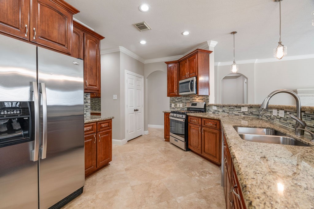 Kitchen with granite counters.refrigerator included