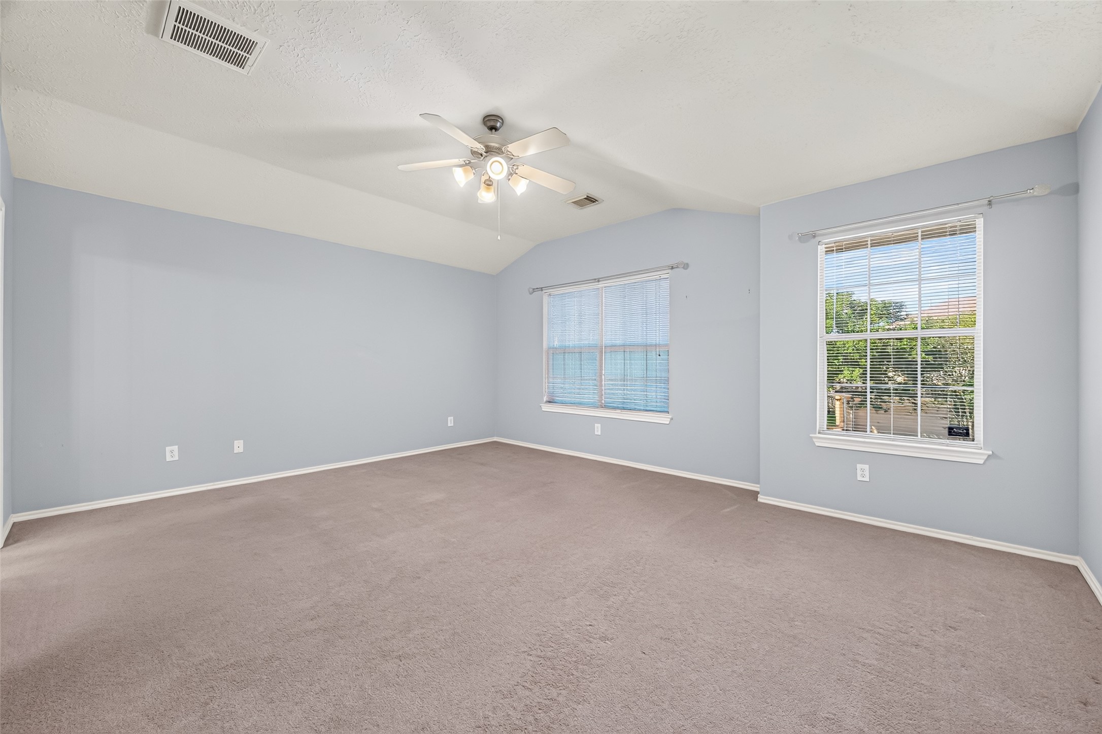 Spacious primary bedroom upstairs!