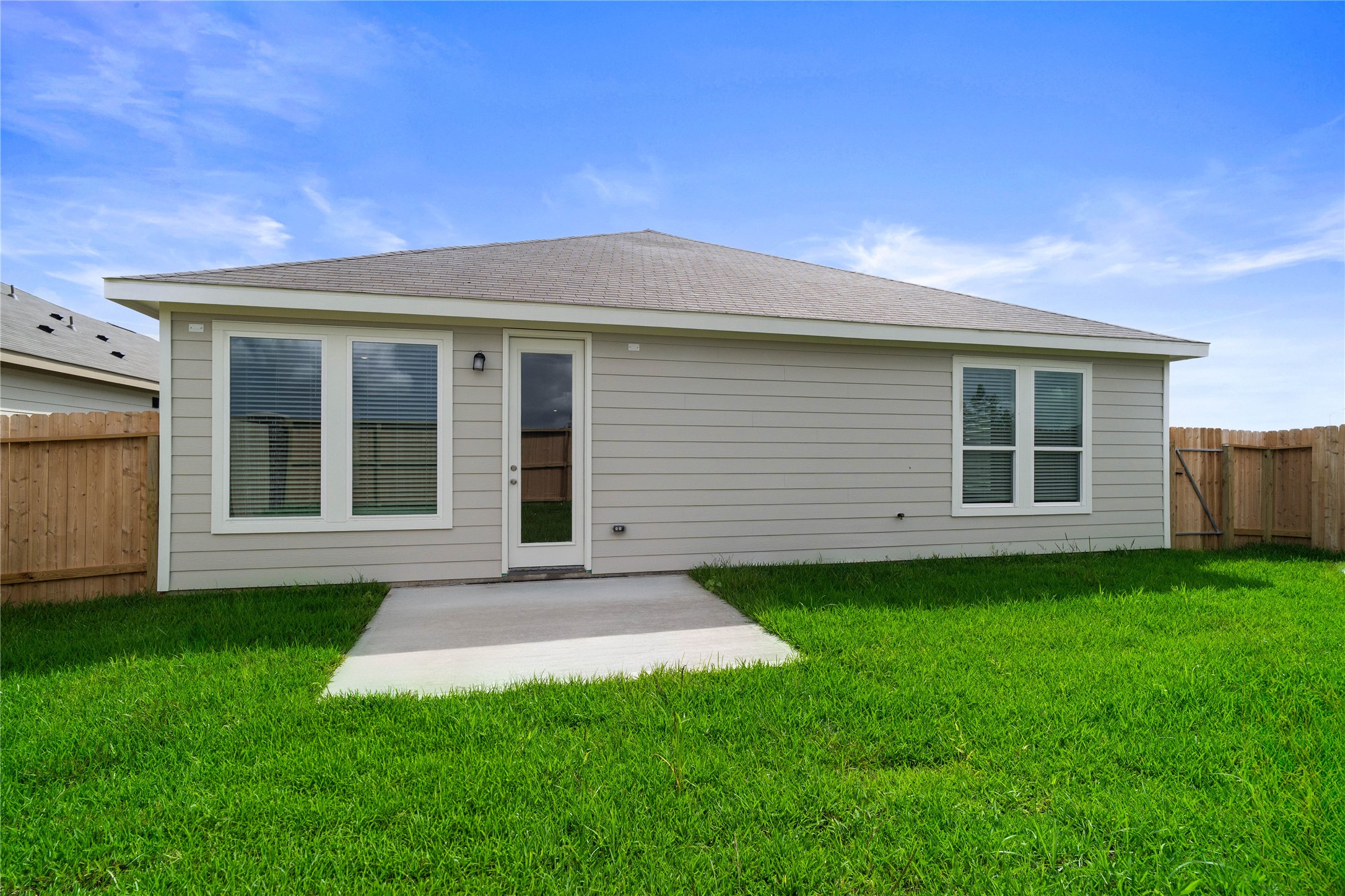 Step outside to this inviting private, fenced backyard with ample green space. From al fresco dining and weekend BBQs to a custom outdoor lounge, this versatile space provides the perfect foundation to create your own private oasis.