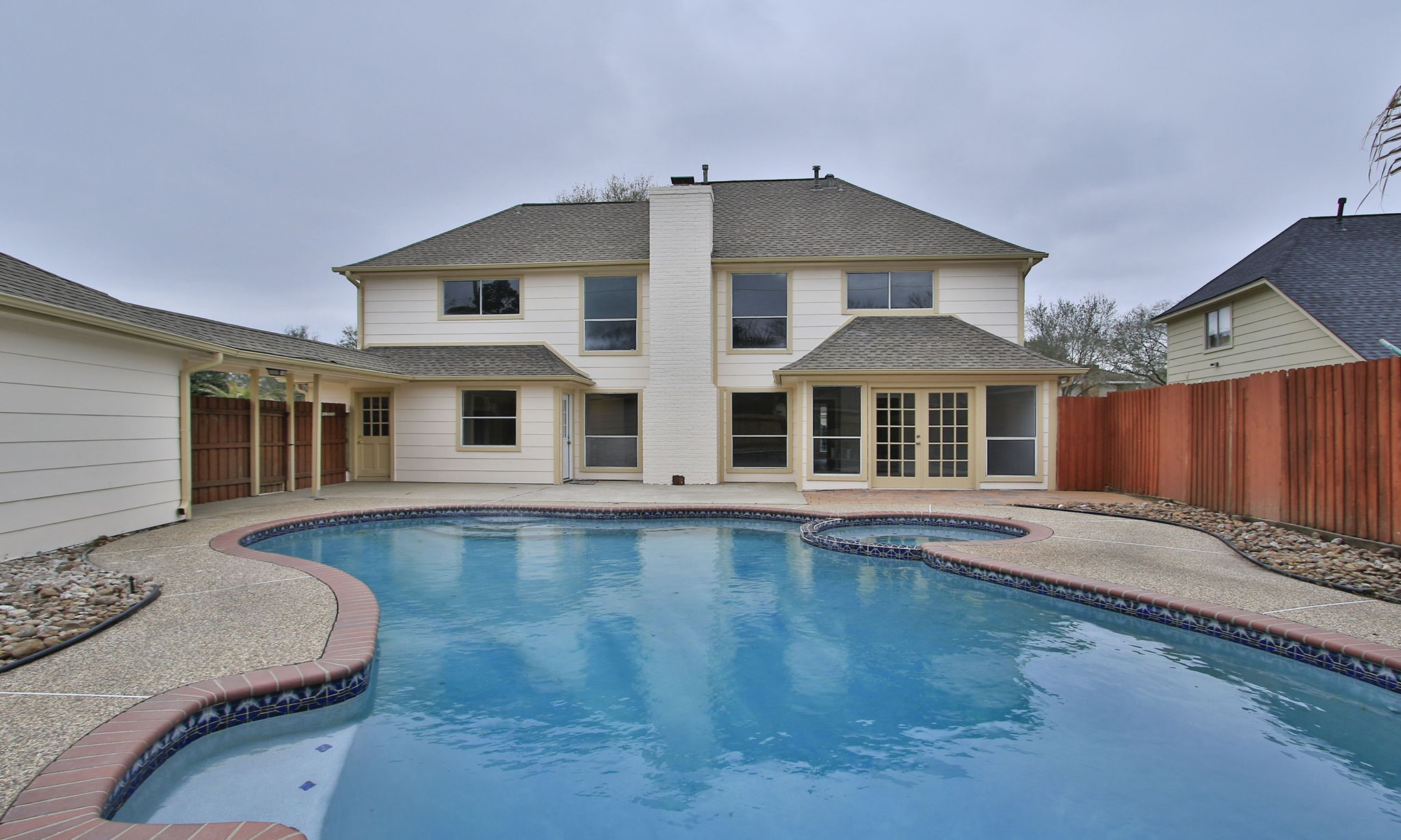 The sparkling pool is the perfect addition to this backyard