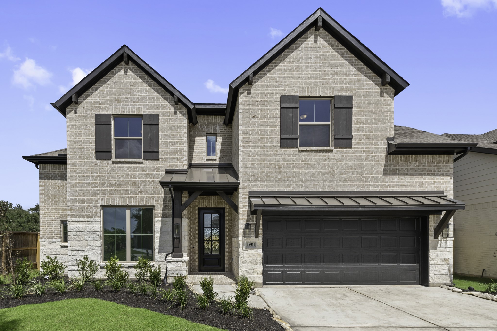 Move-In Ready! Westin Homes | Preston IX  New Construction. Grass is digitally enhanced.