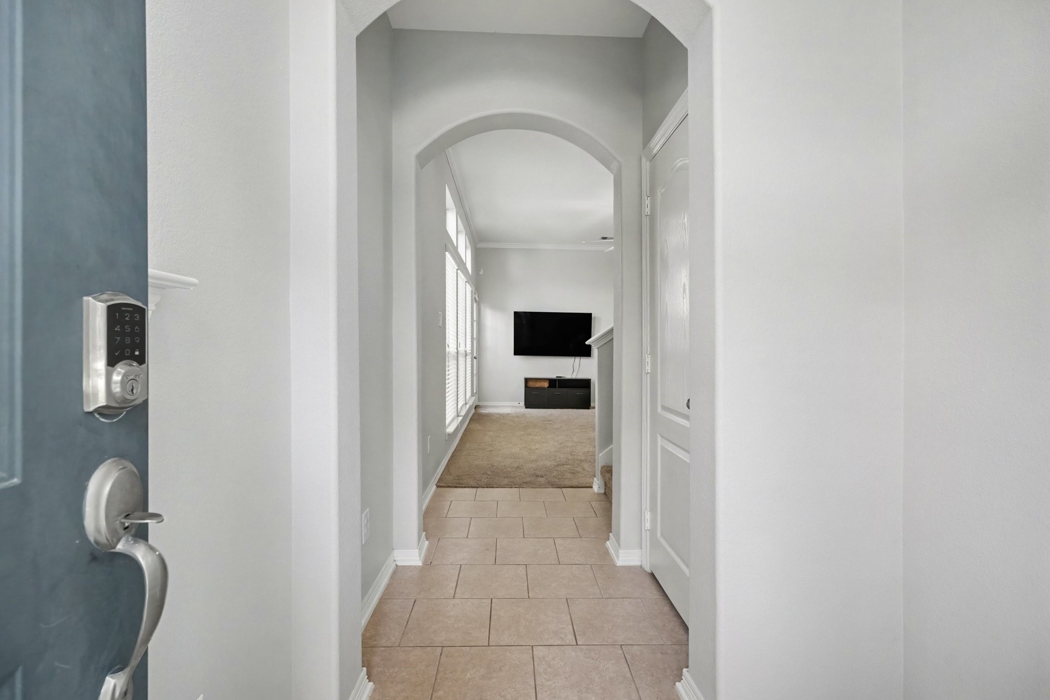 Entry way with large closet for additional storage.