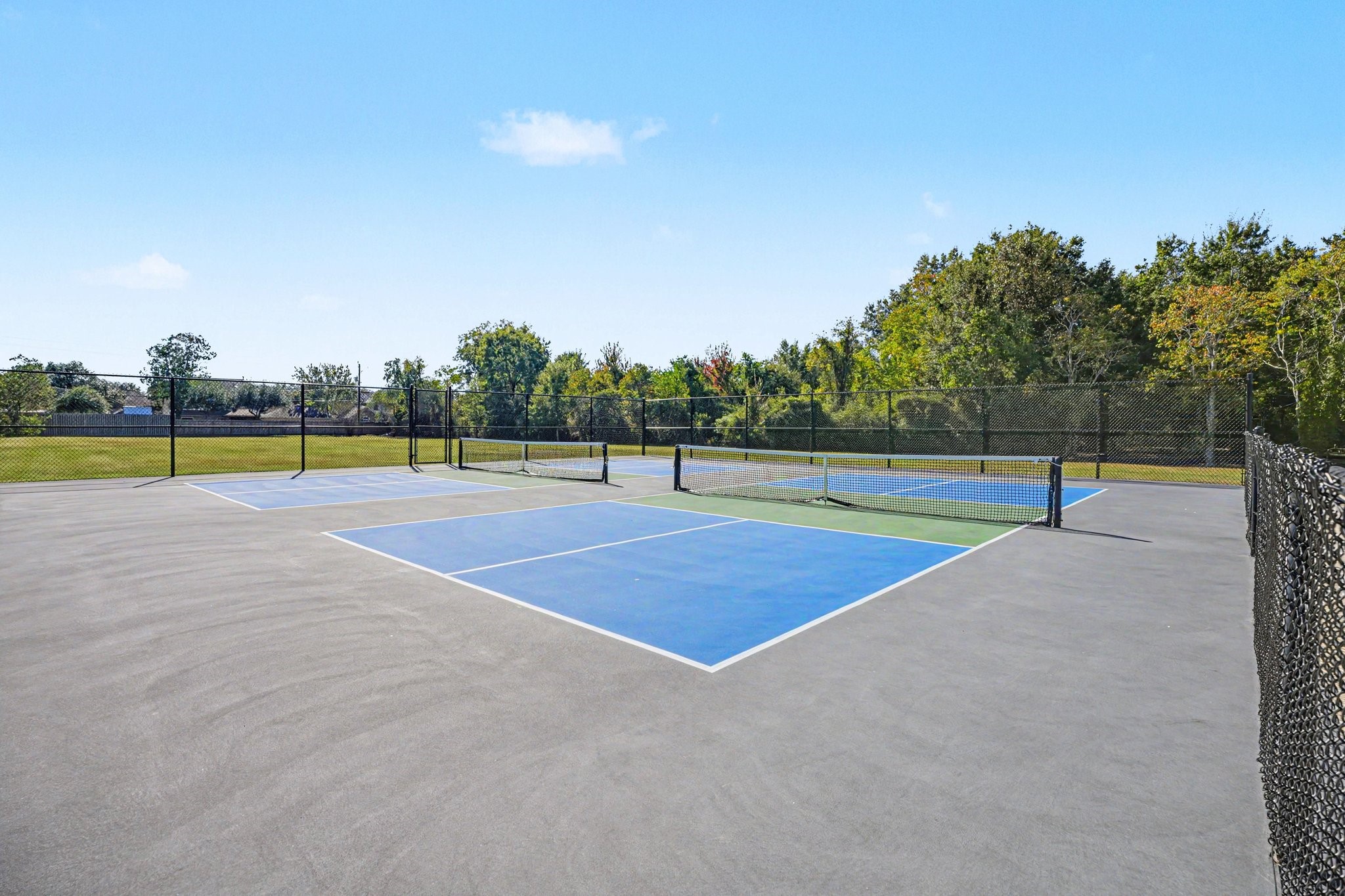 Pickle Ball & Tennis courts located across the street.