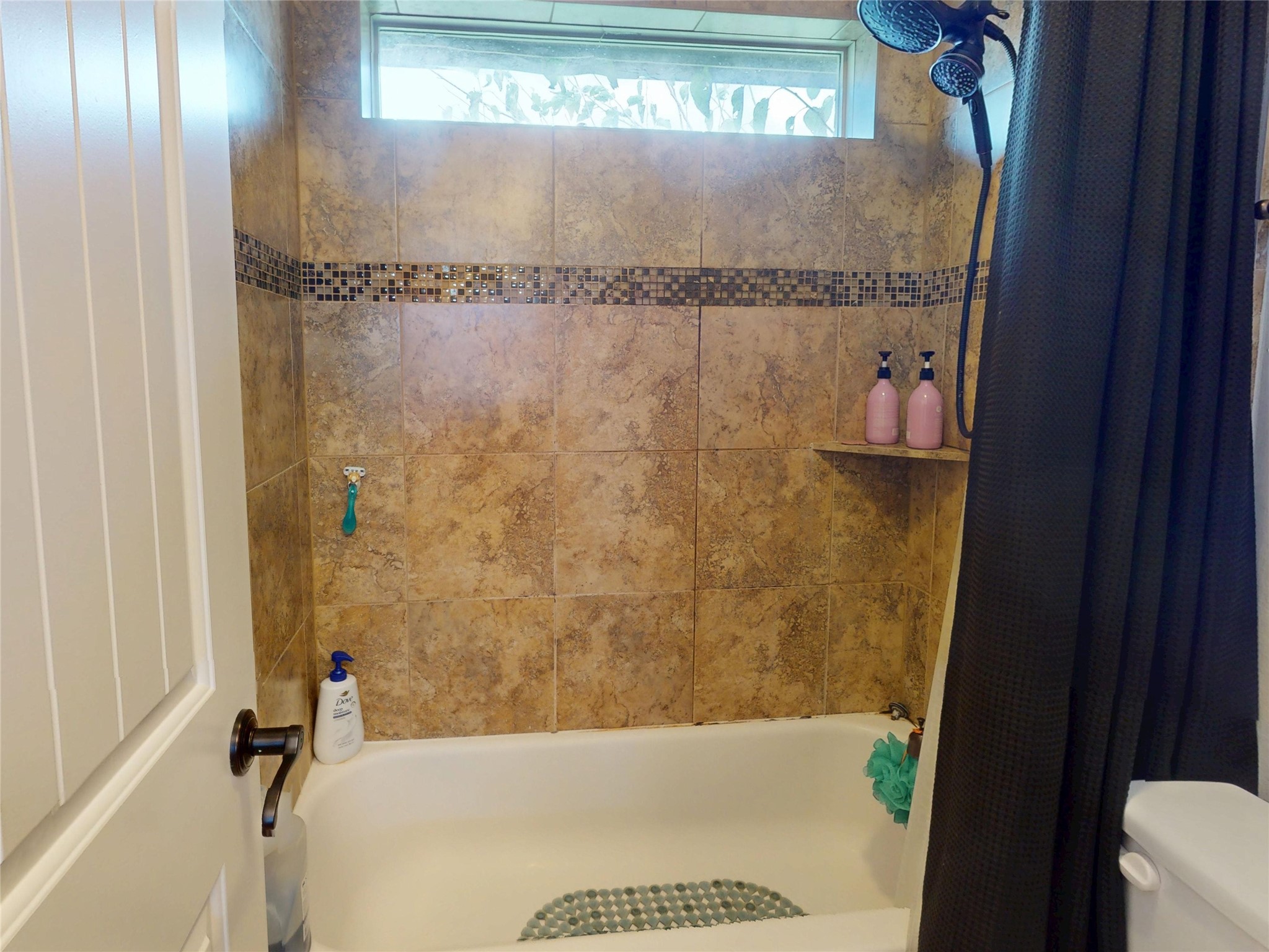 Tub and shower with full tile surround