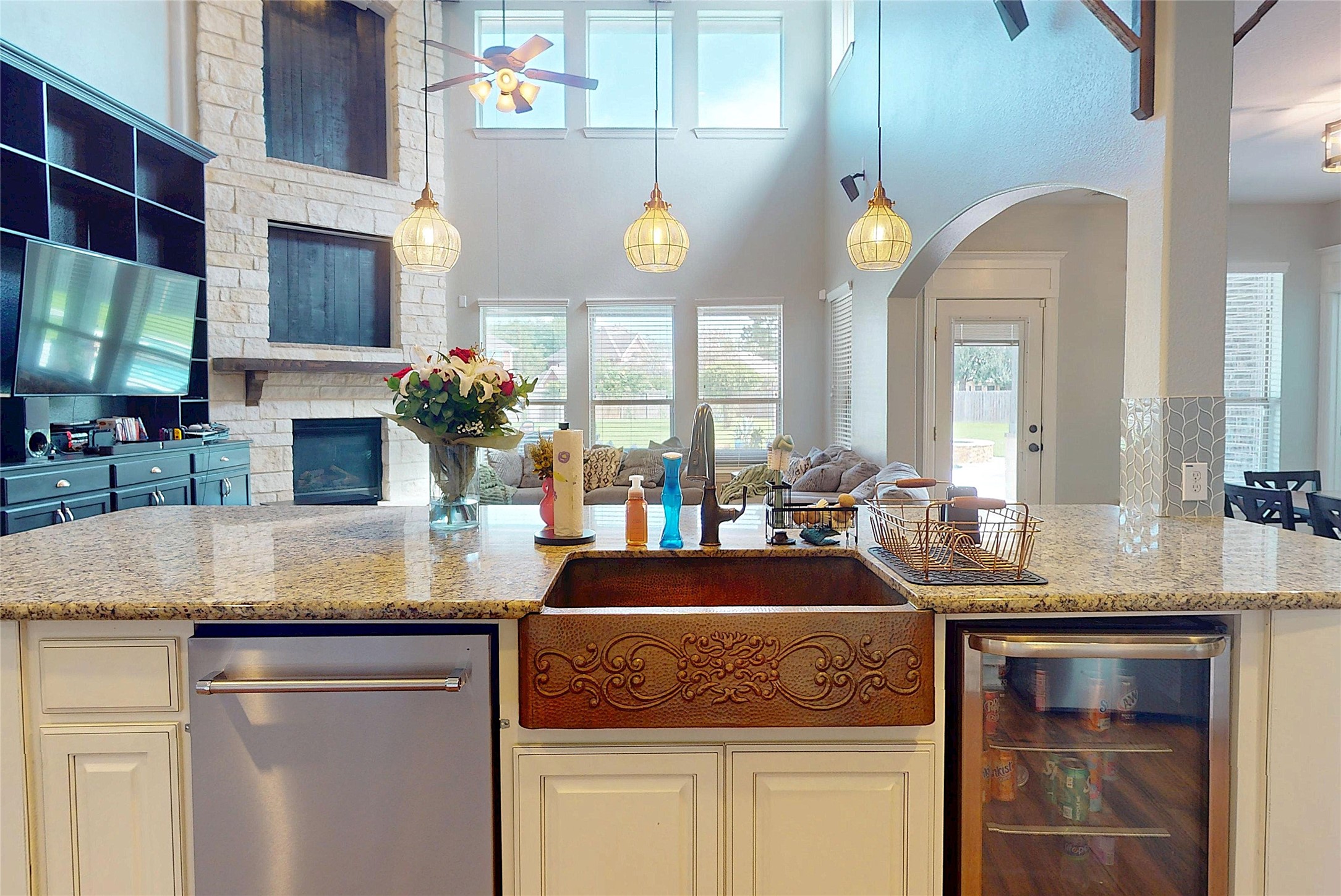 Apron-front sink on the island, open to the living room