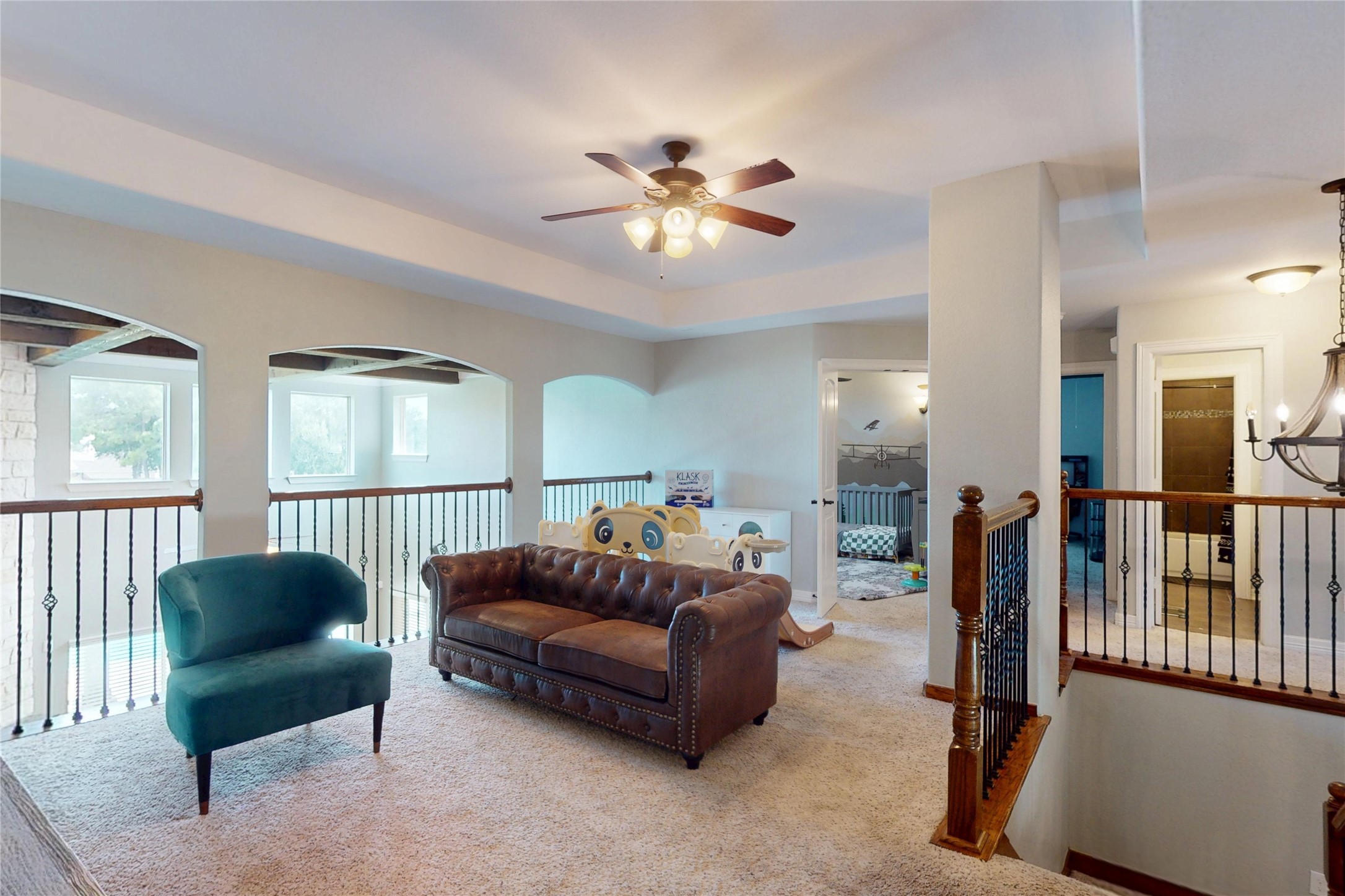 Upstairs game room open to the entry below