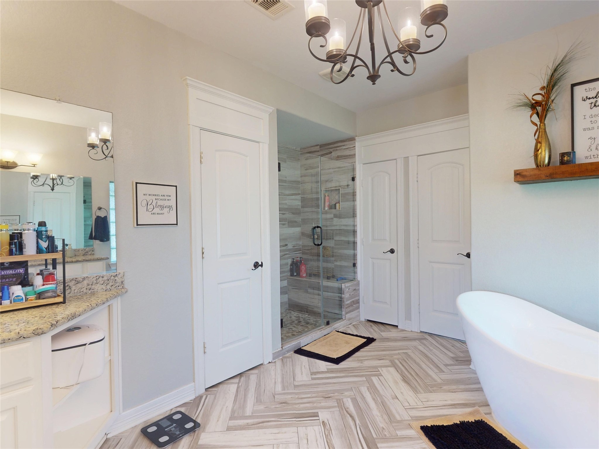 Primary bath - freestanding tub, tiled shower, herringbone floor