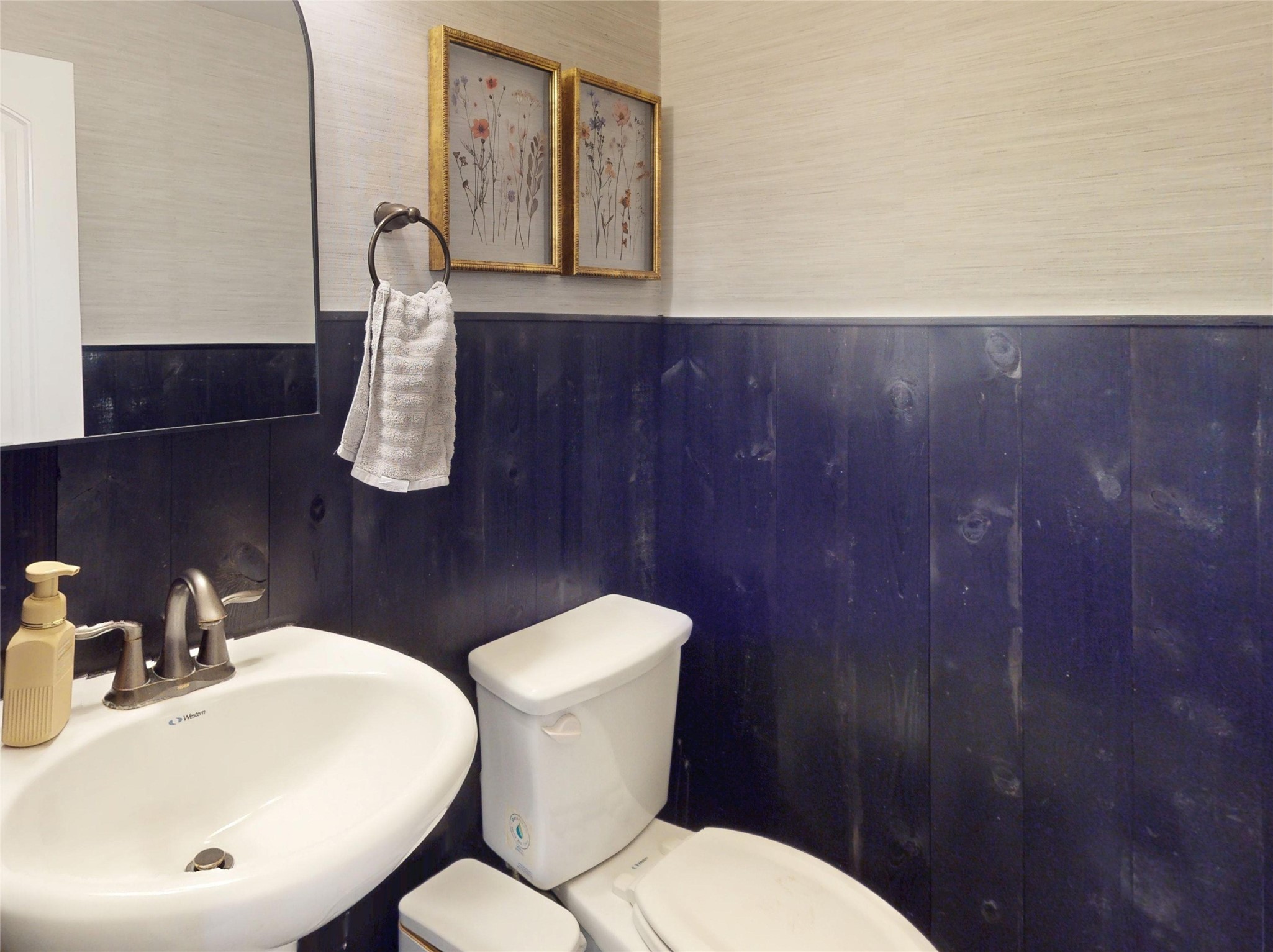 Secondary bath with navy board-and-batten