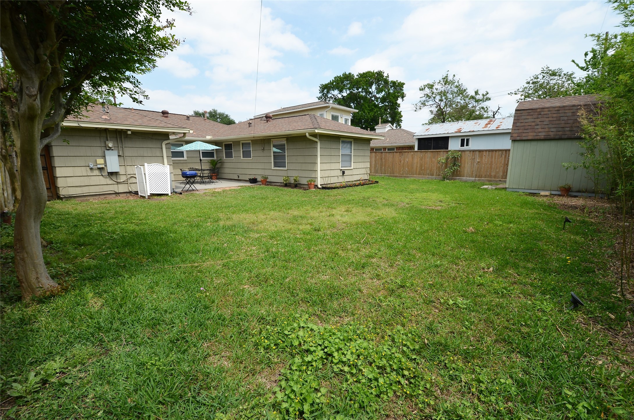 Spacious backyard, perfect for gatherings.