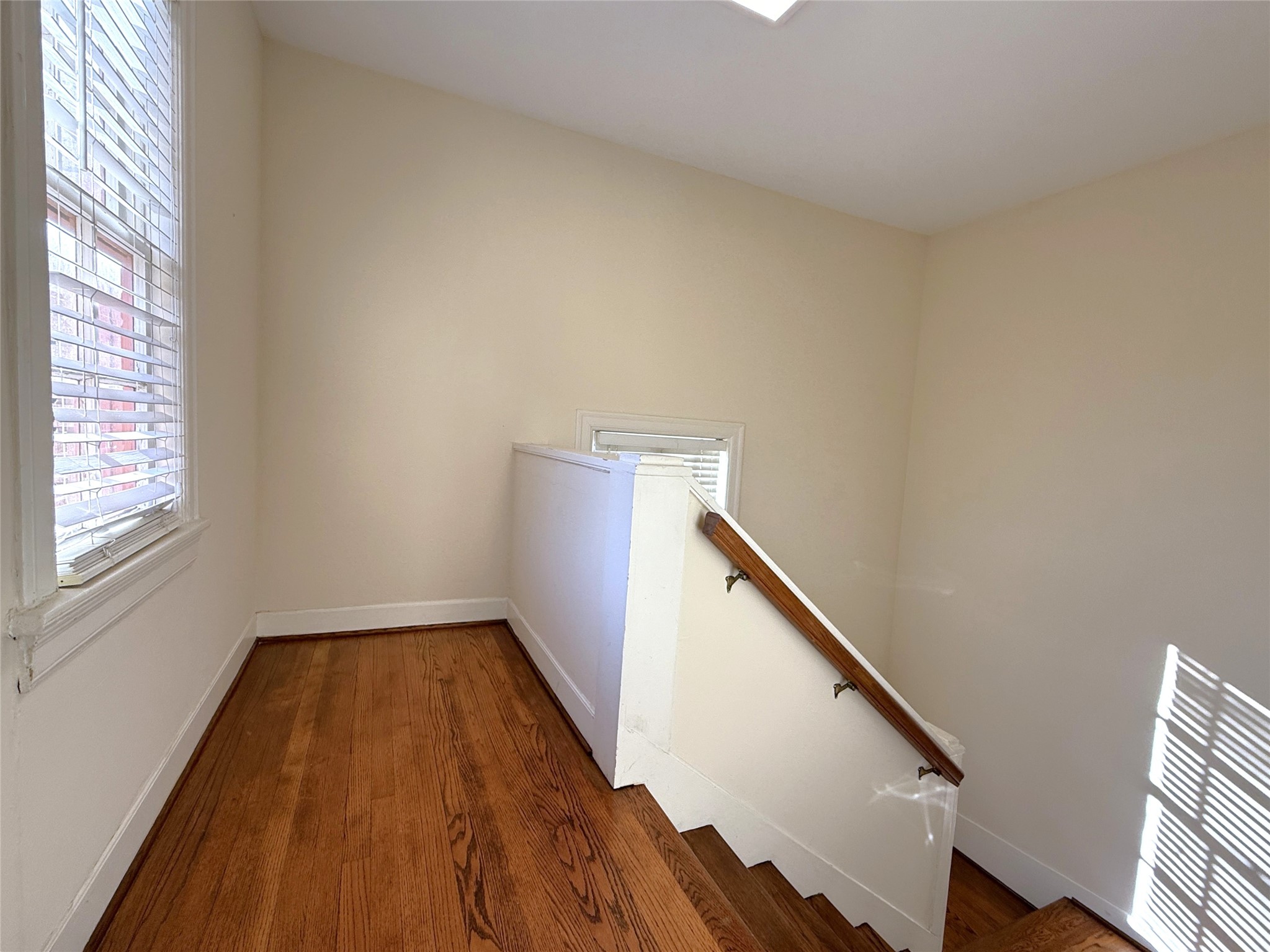From two windows, natural light flows into the stairway leading up to unit #2 From two windows, natural light flows into the stairway leading up to unit #2