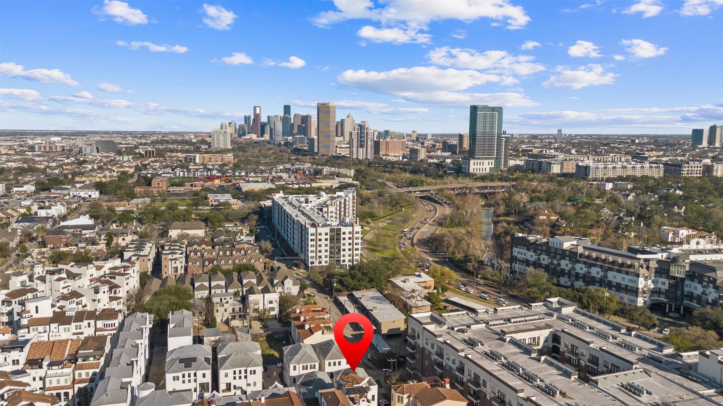 Downtown Houston skyline view illustrating the home's convenient location with quick access to the city's business and entertainment districts.