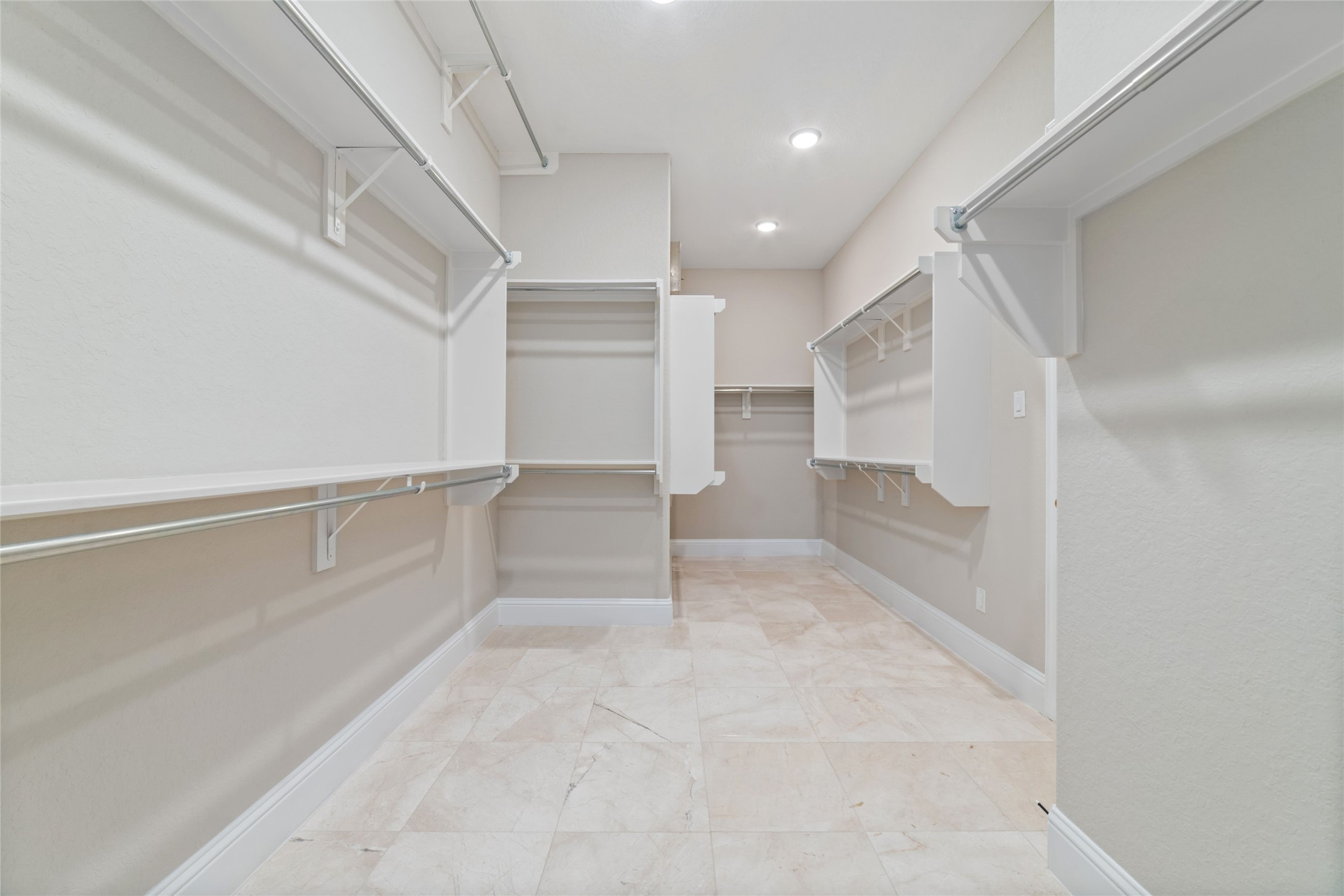 huge walk-in closing that connects to the laundry