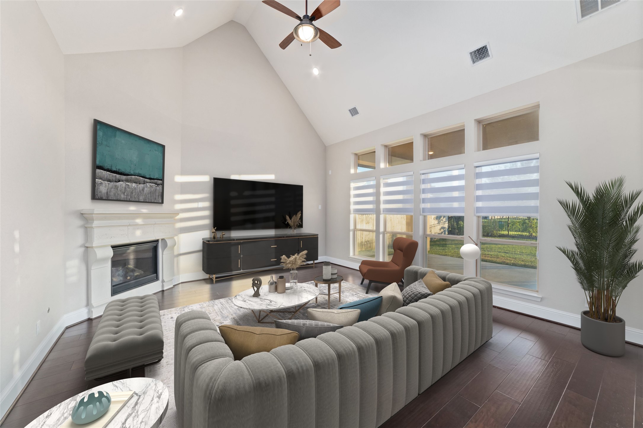 virtual staged family room with high ceiling, cozy fireplace