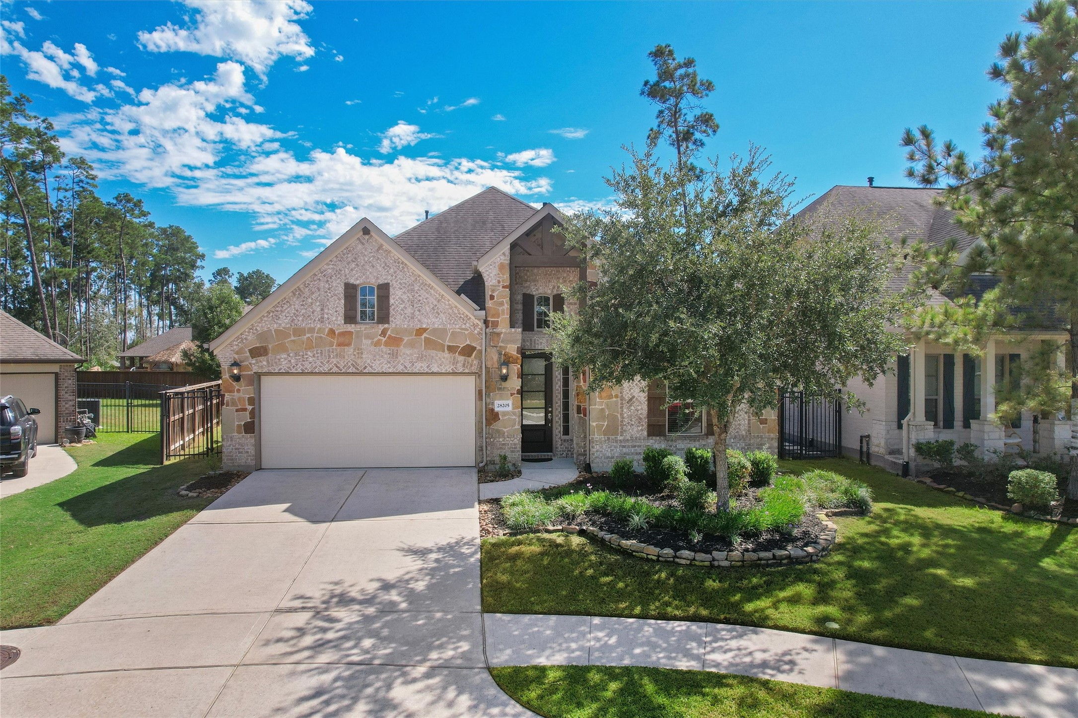 Double wide driveway and concrete sidewalks