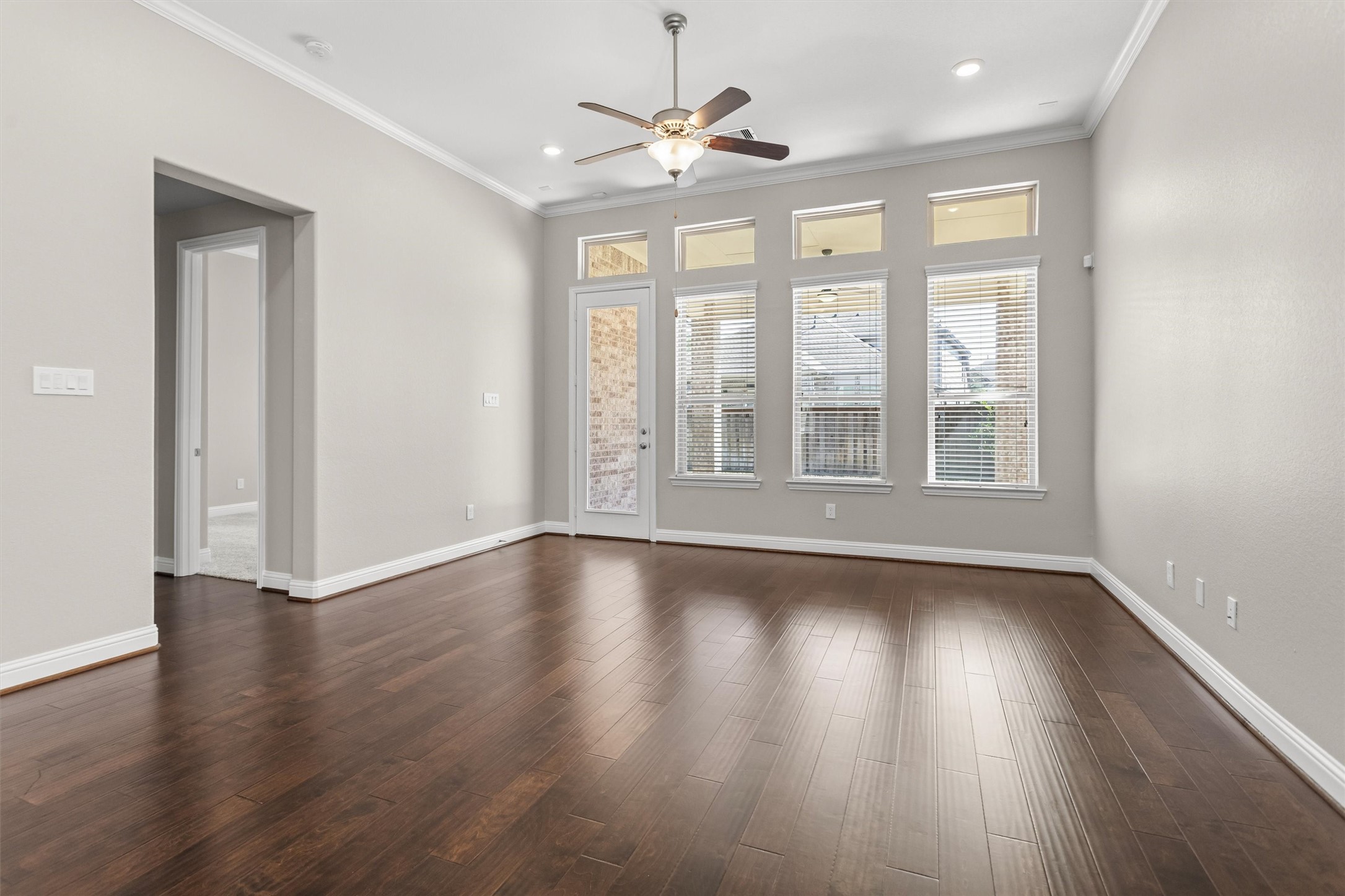 Primary suite off hallway to the left of the living area
