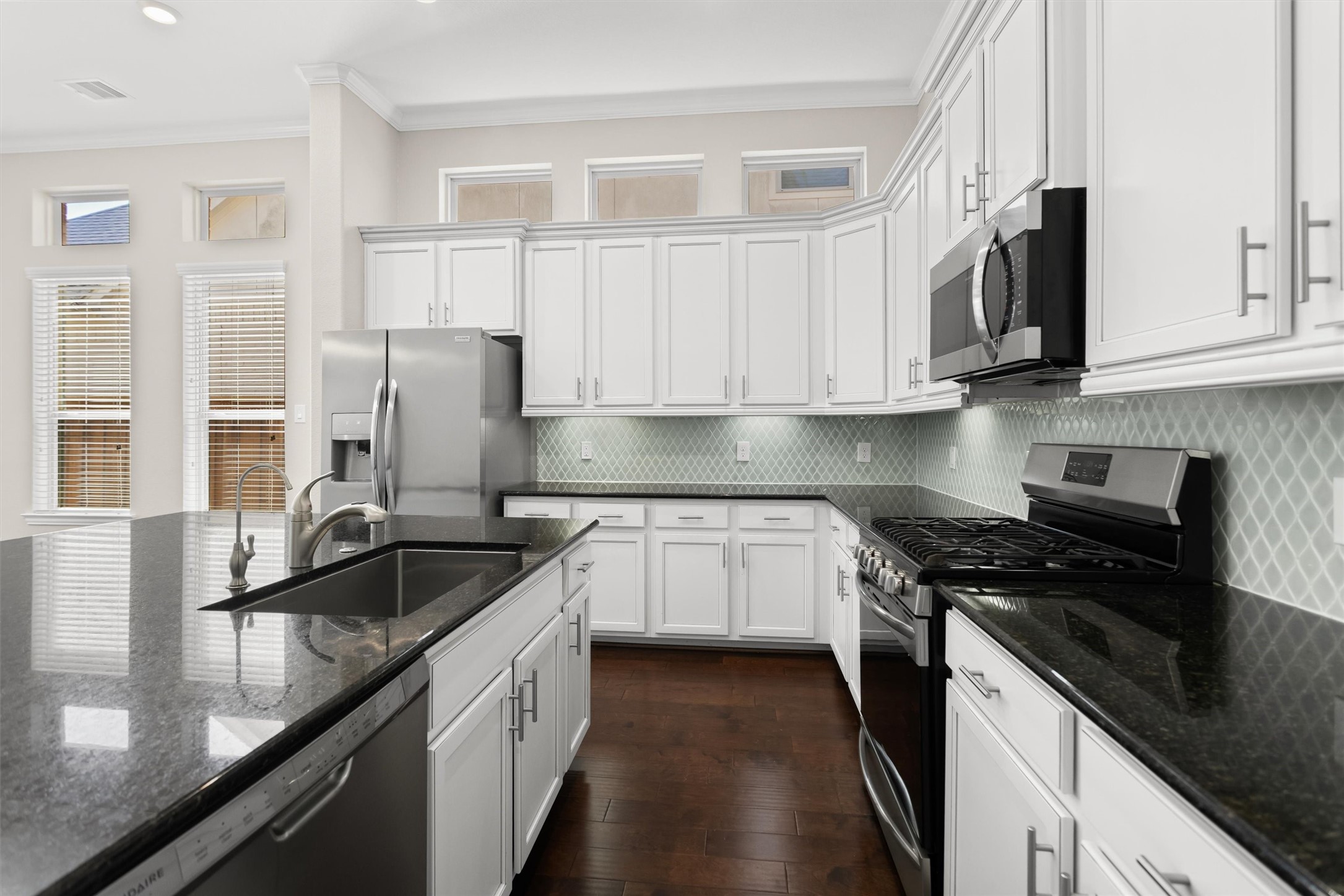 Ample cabinetry in this large kitchen.
