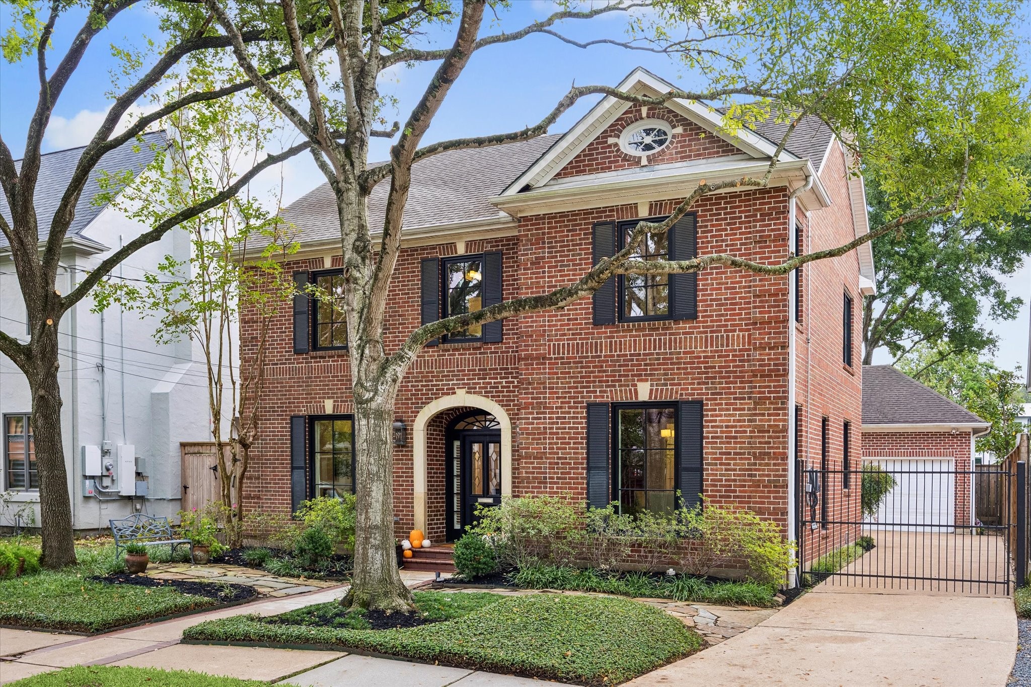 One of the prettiest homes on the block! This home offers stylish updates throughout including a remodeled kitchen and primary bath, new windows, new fireplace, tankless hot water heater, EV charger, built-in wine storage & more.