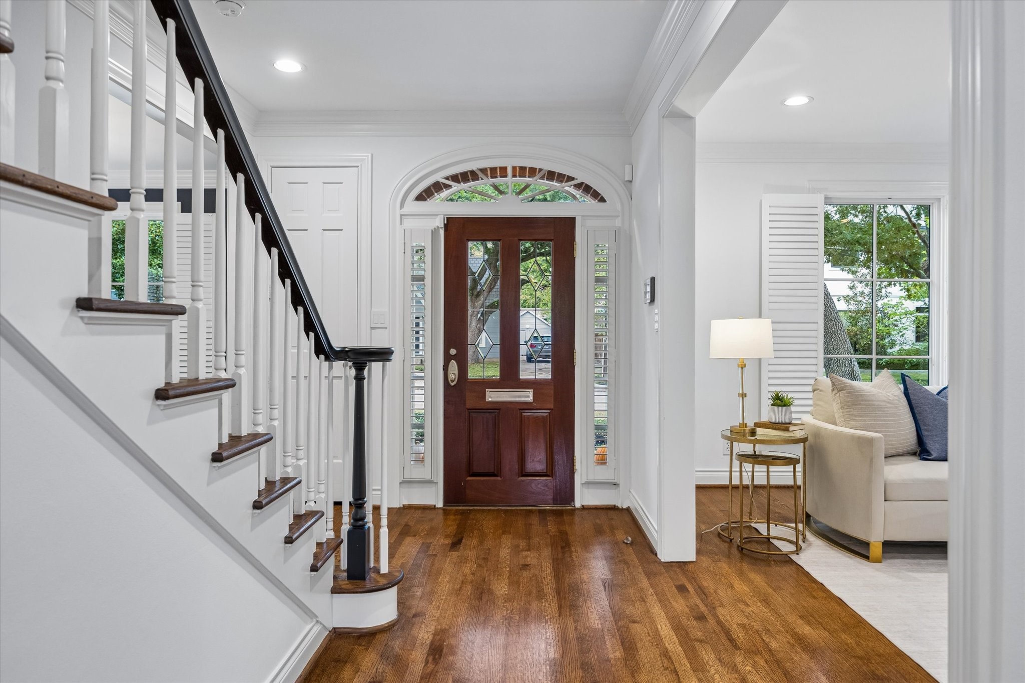 A gracious entry welcomes you with high ceilings, beautiful hardwoods and so much natural light.