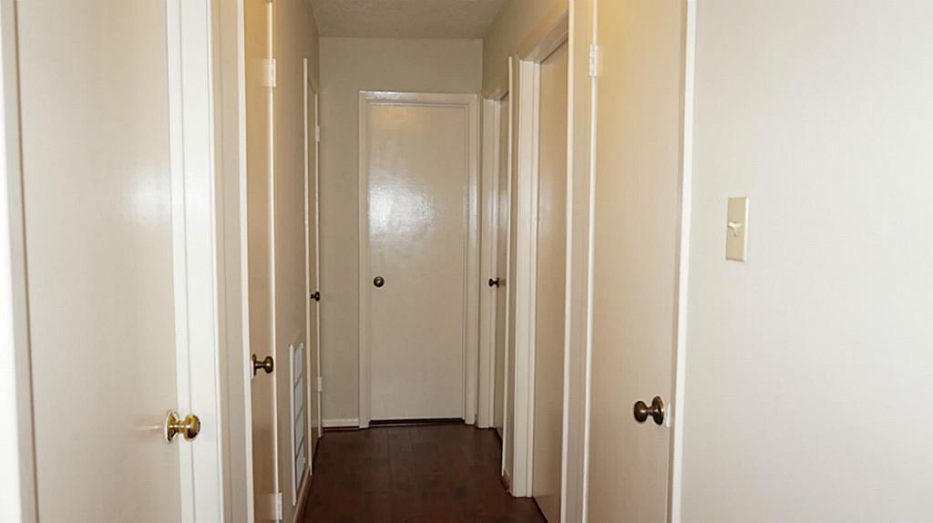 Hallway, 3 extra closets there