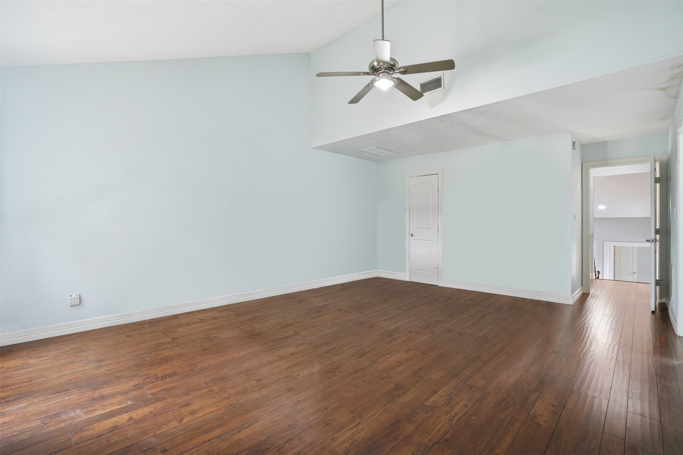 Primary bedroom offers a spacious layout with the added convenience of not just one, but two closets for exceptional storage.