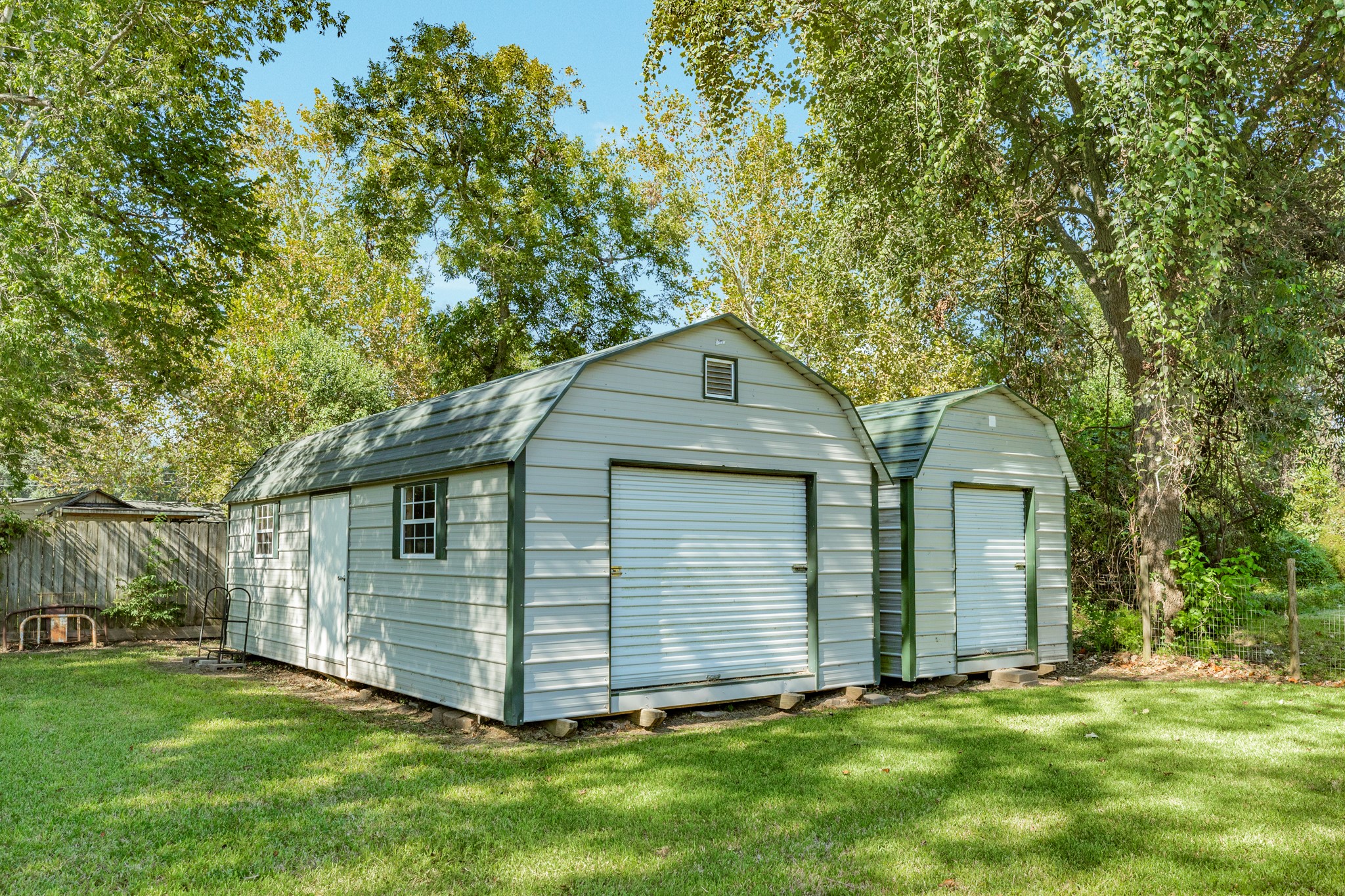 TWO storage buildings