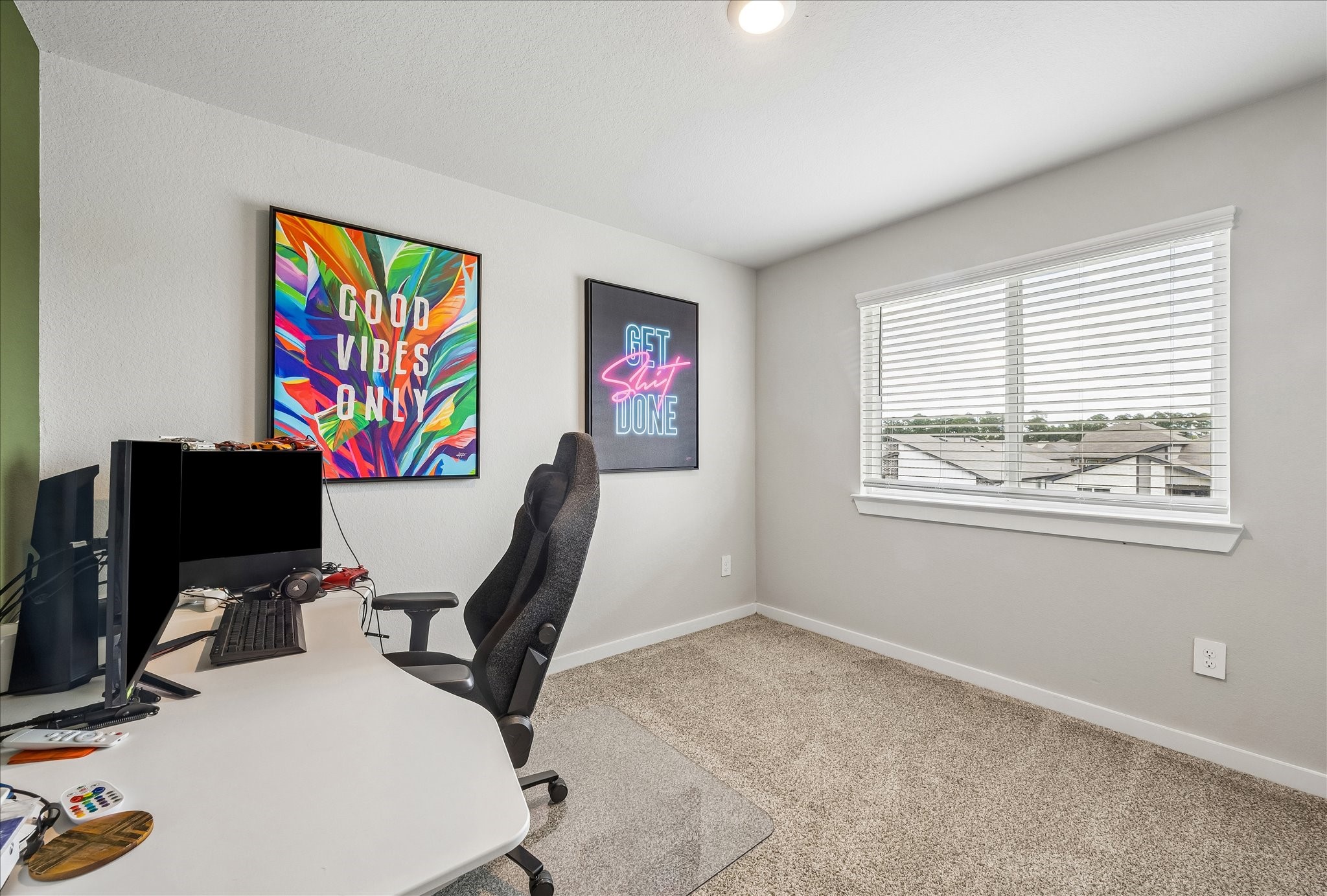 The 4th bedroom, second up, is being used as another home office.