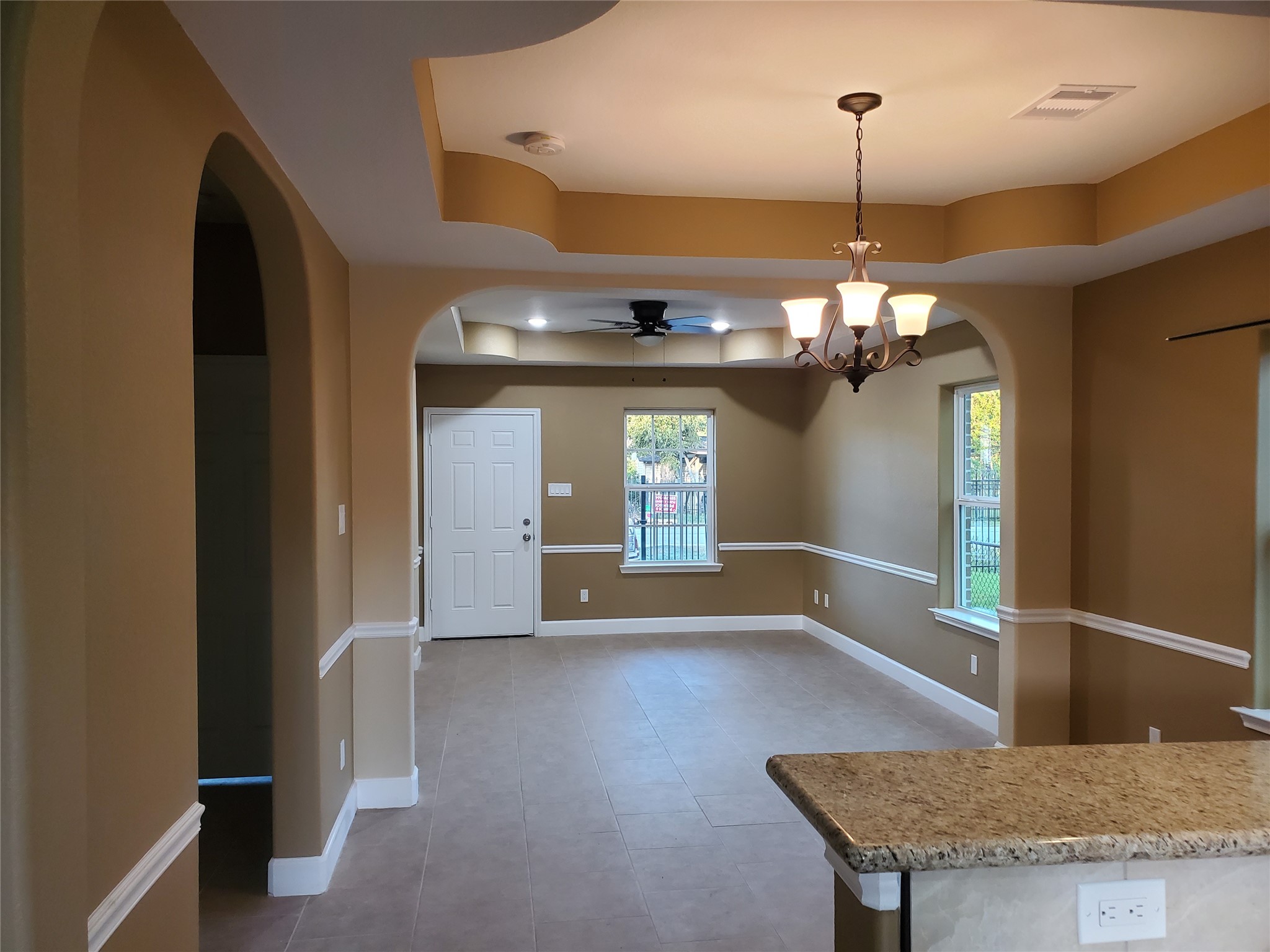 Kitchen open to Dining & Decor Ceiling