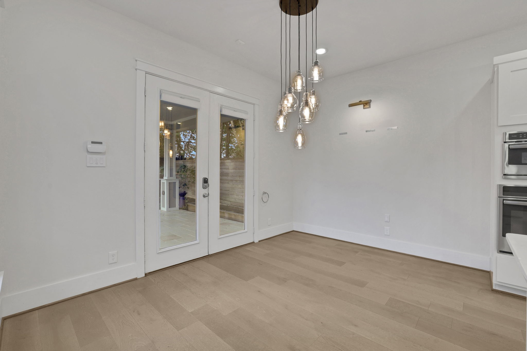 Generous floor space and a statement chandelier.