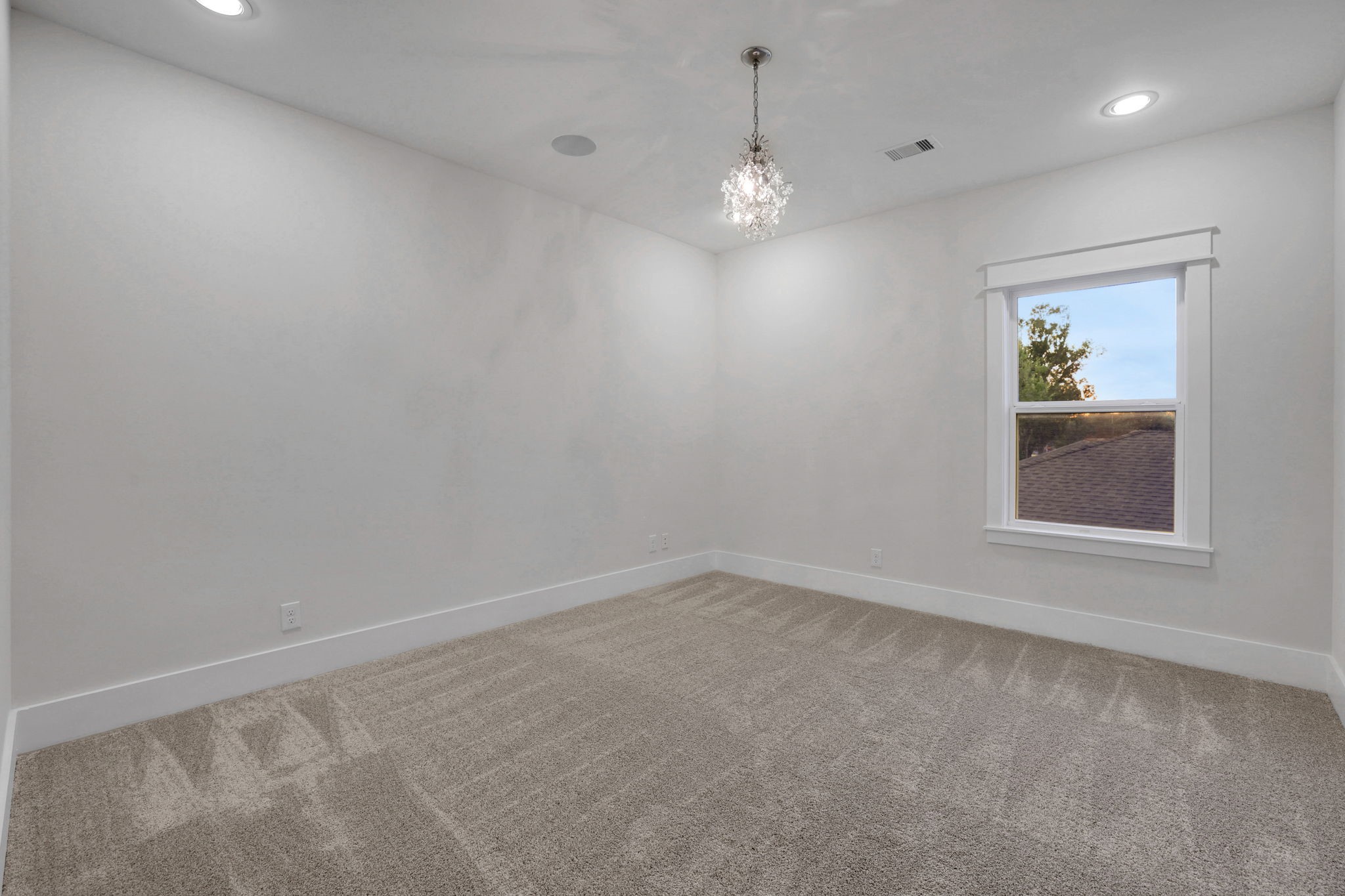 The unfurnished view shows flexible floor space.
