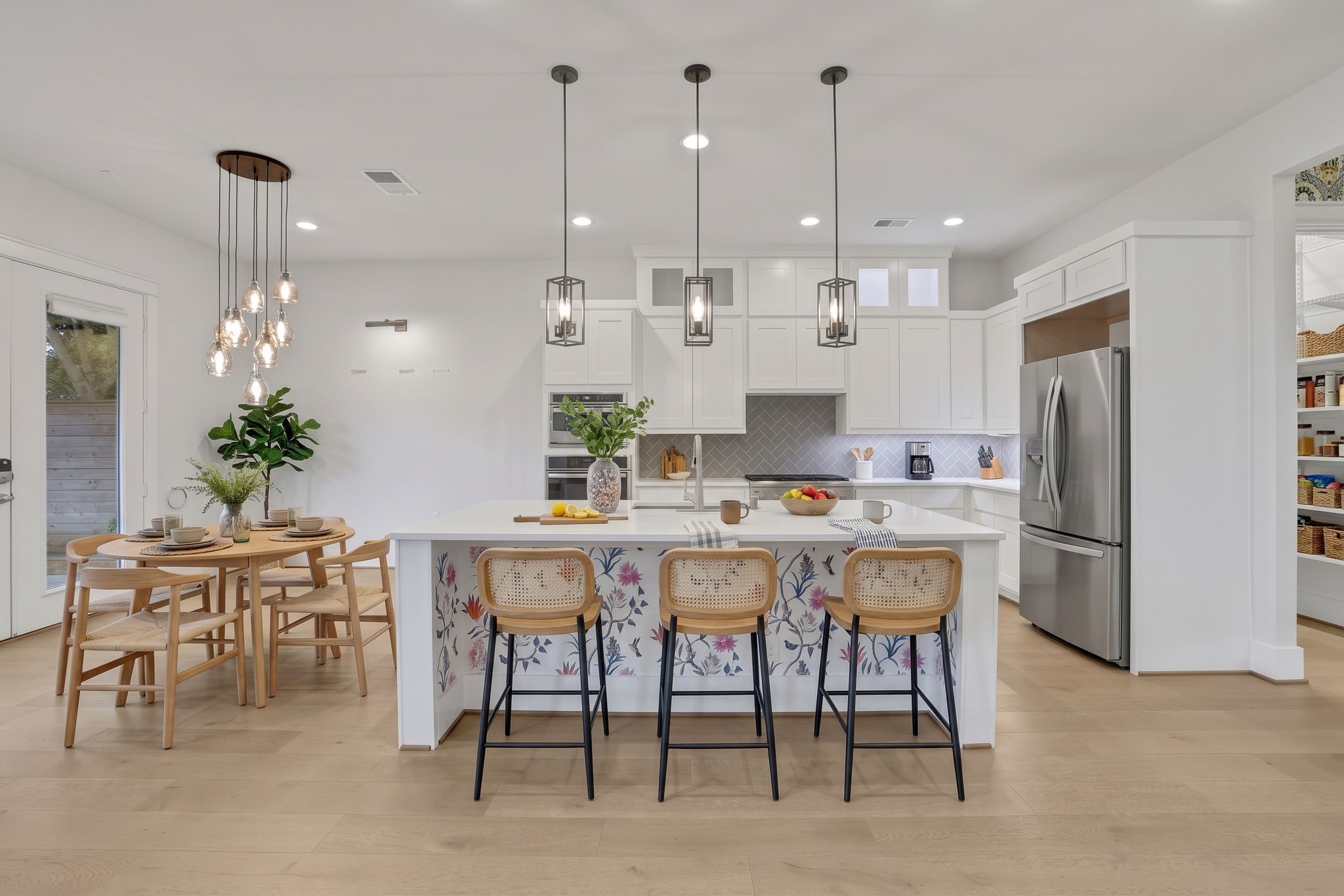 A wood island and counter seating make the kitchen the center of the home.