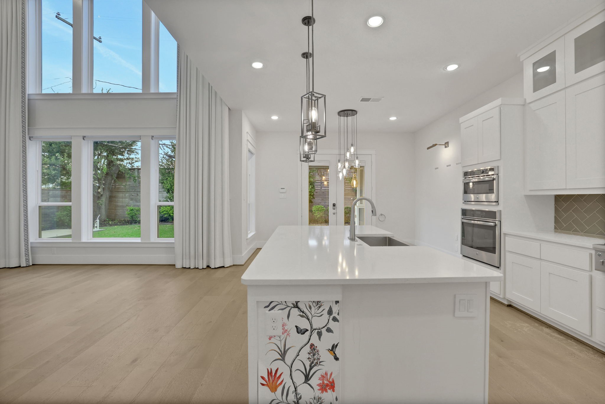 Natural light fills the kitchen workspace.