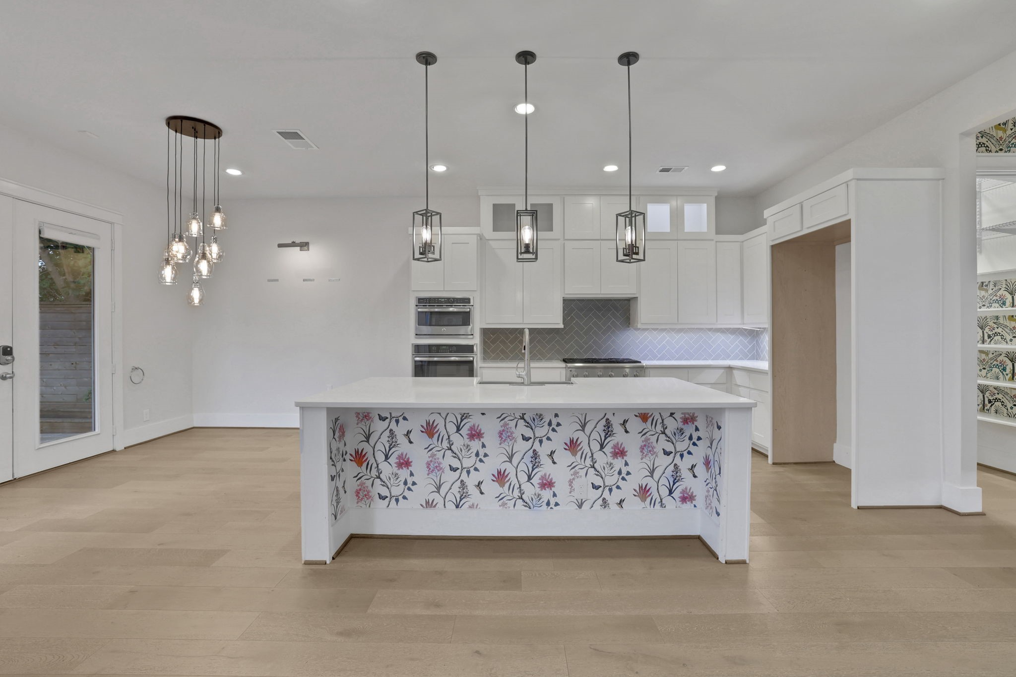The island workspace and surrounding storage without furnishings.