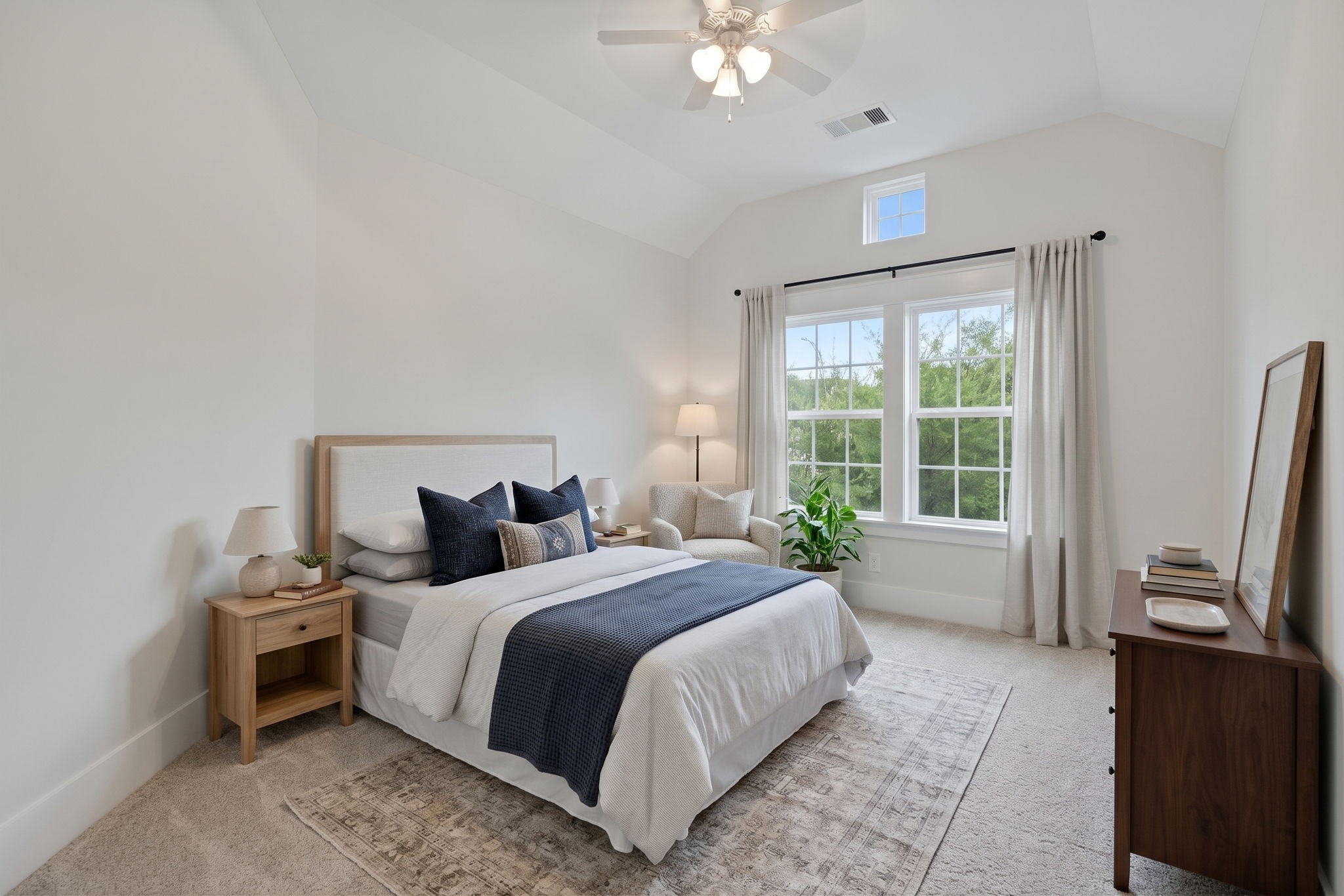 A comfortable bedroom with room for everyday living.