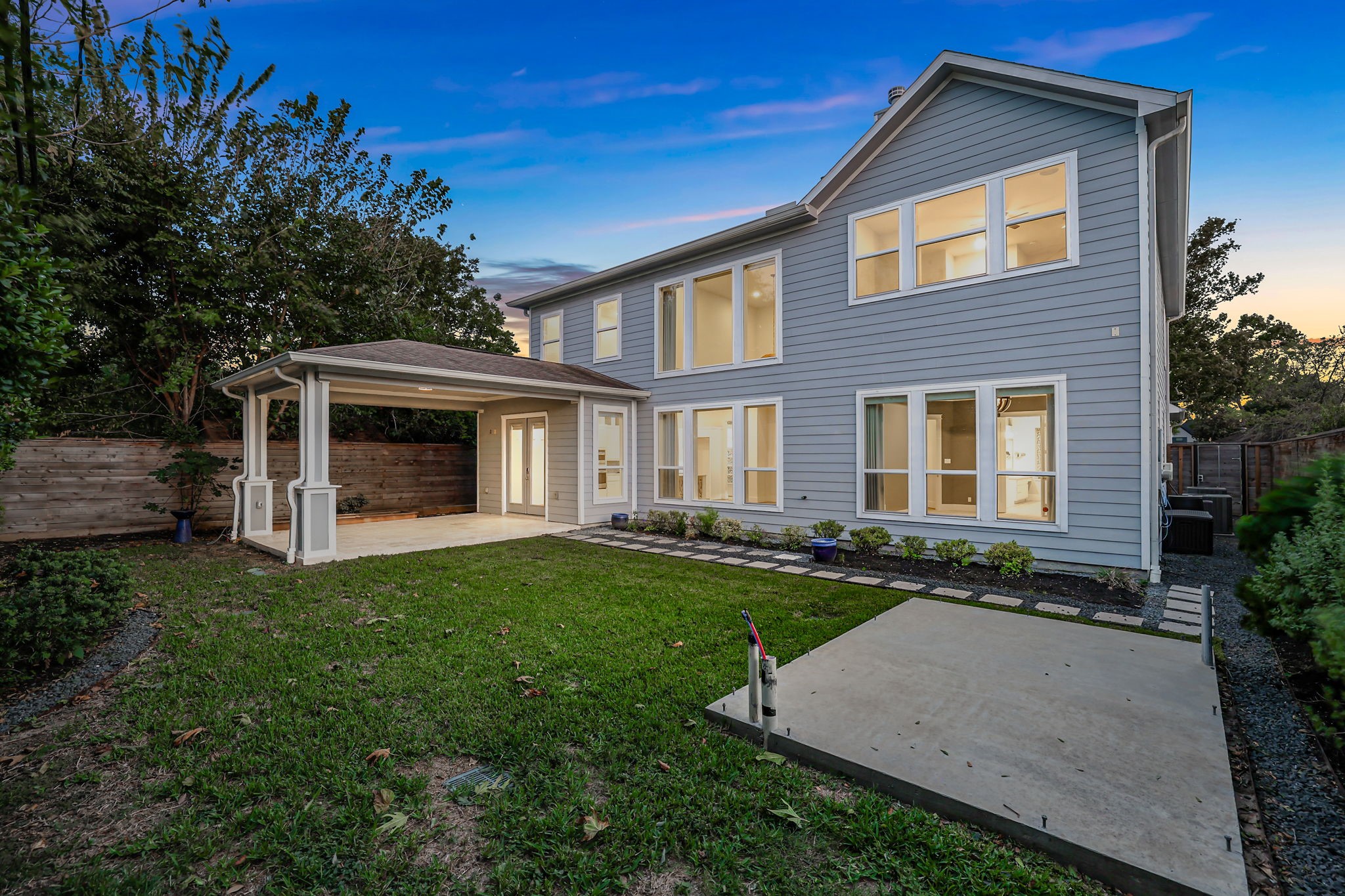 A full view of the home and its landscaping.
