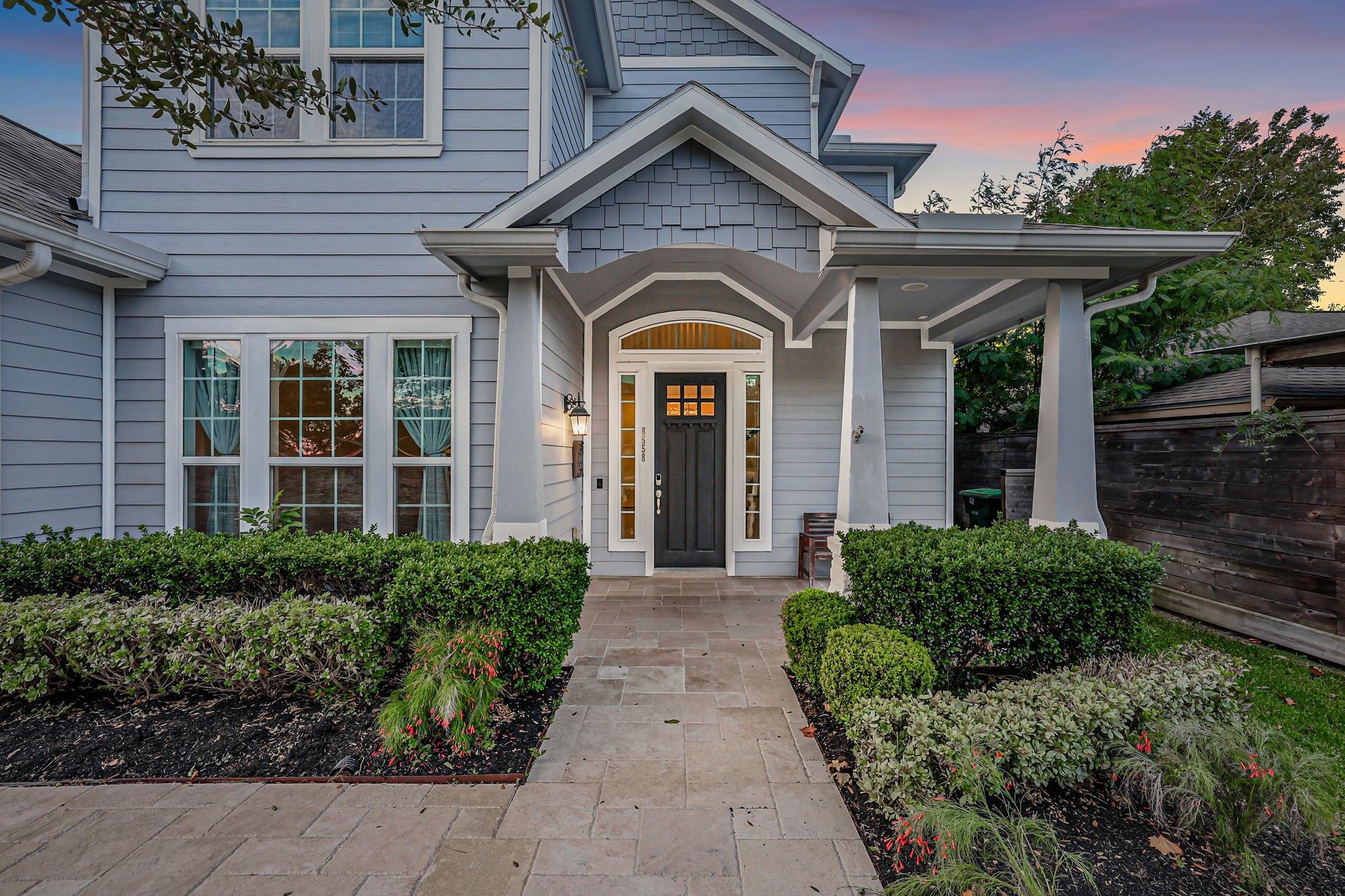 A landscaped walk leads to the covered front entry. A landscaped walk leads to the covered front entry.