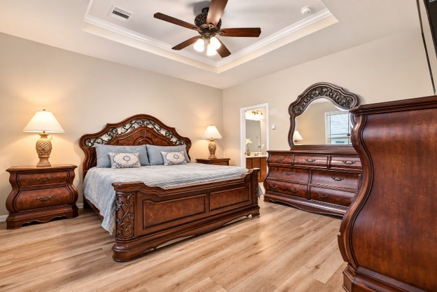 oversized primary bedroom with new floors, 1st floor