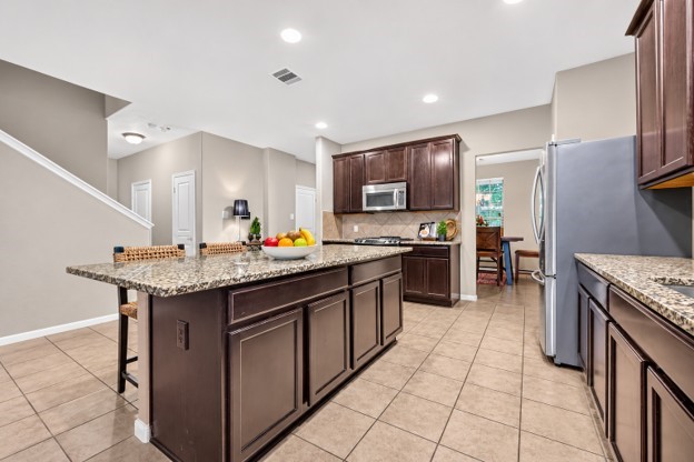 kitchen with easy access opening to dining