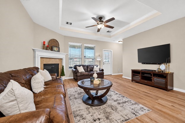 View of living room with crown molding