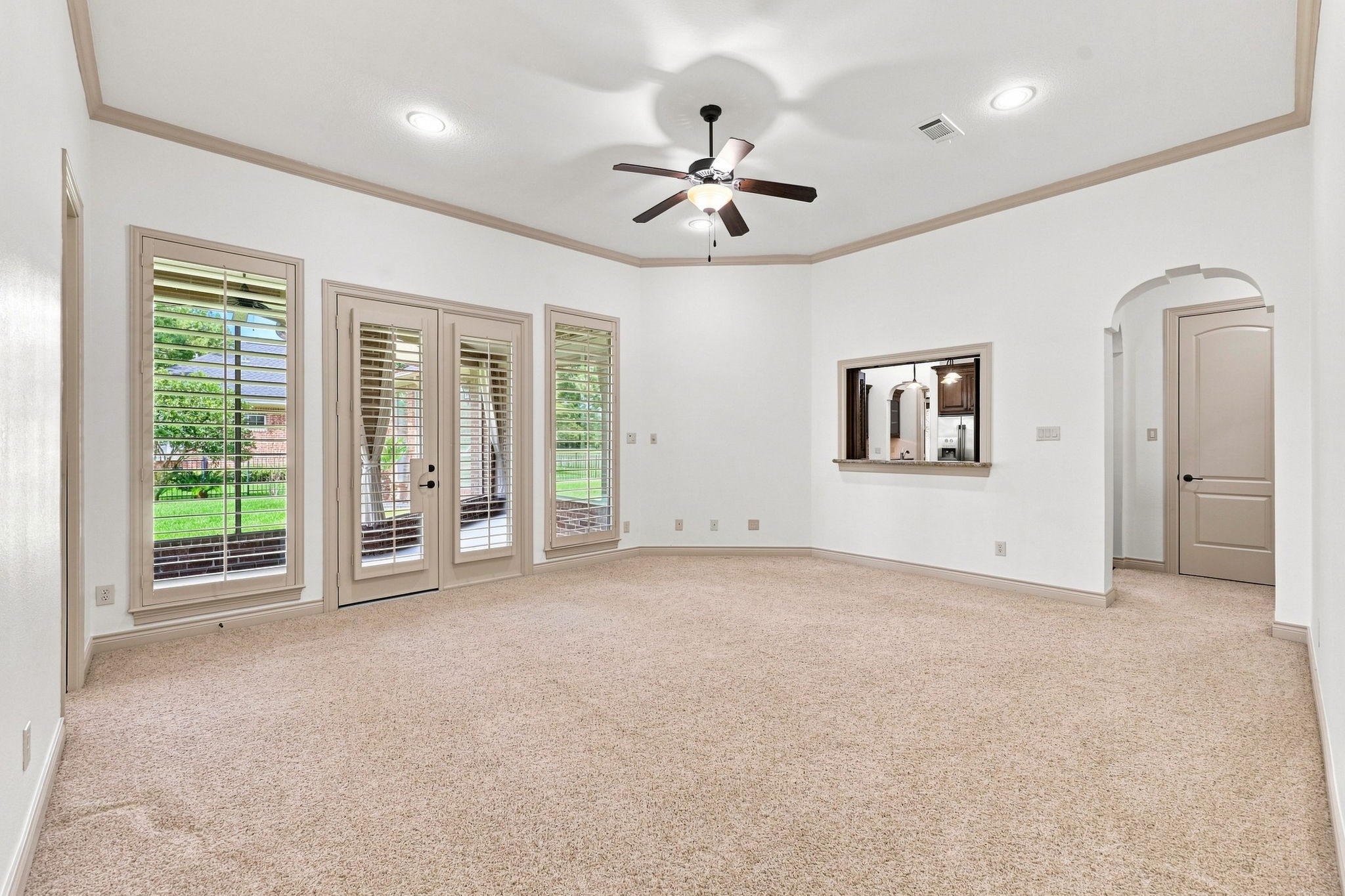 Another view of the spacious Game Room looking toward the Kitchen area.
