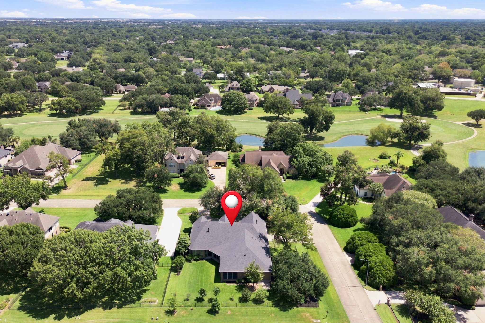 This view looks east across the surrounding area, offering another beautiful perspective of the homes peaceful setting and the natural beauty that surrounds the property.