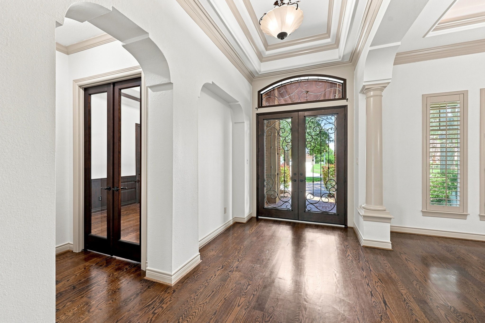 Just off the foyer, a private home office is thoughtfully positioned at the front of the home and accessed through elegant double glass doors. This beautifully appointed space offers a quiet and inviting setting for working from home, studying, or managing daily business.
