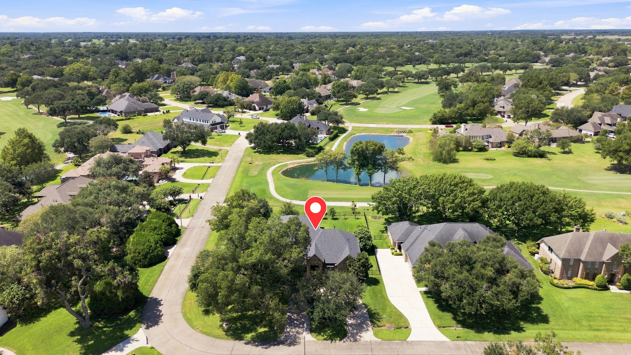 Welcome to 5411 Woodbury Street. with an exceptional golf course setting, with the home pinpointed for easy viewing. The photo showcases the beautiful golf course backdrop, tranquil pond, and mature wooded surroundings that make this half-Acre homesite truly special. Welcome to 5411 Woodbury Street. with an exceptional golf course setting, with the home pinpointed for easy viewing. The photo showcases the beautiful golf course backdrop, tranquil pond, and mature wooded surroundings that make this half-Acre homesite truly special.