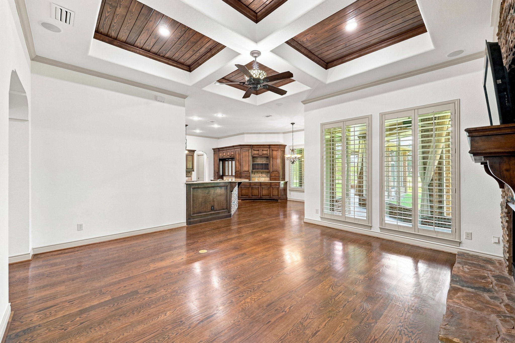 This view from a different angle looks toward the Kitchen and Breakfast area, showcasing the open-concept design and easy flow between the main living spaces.