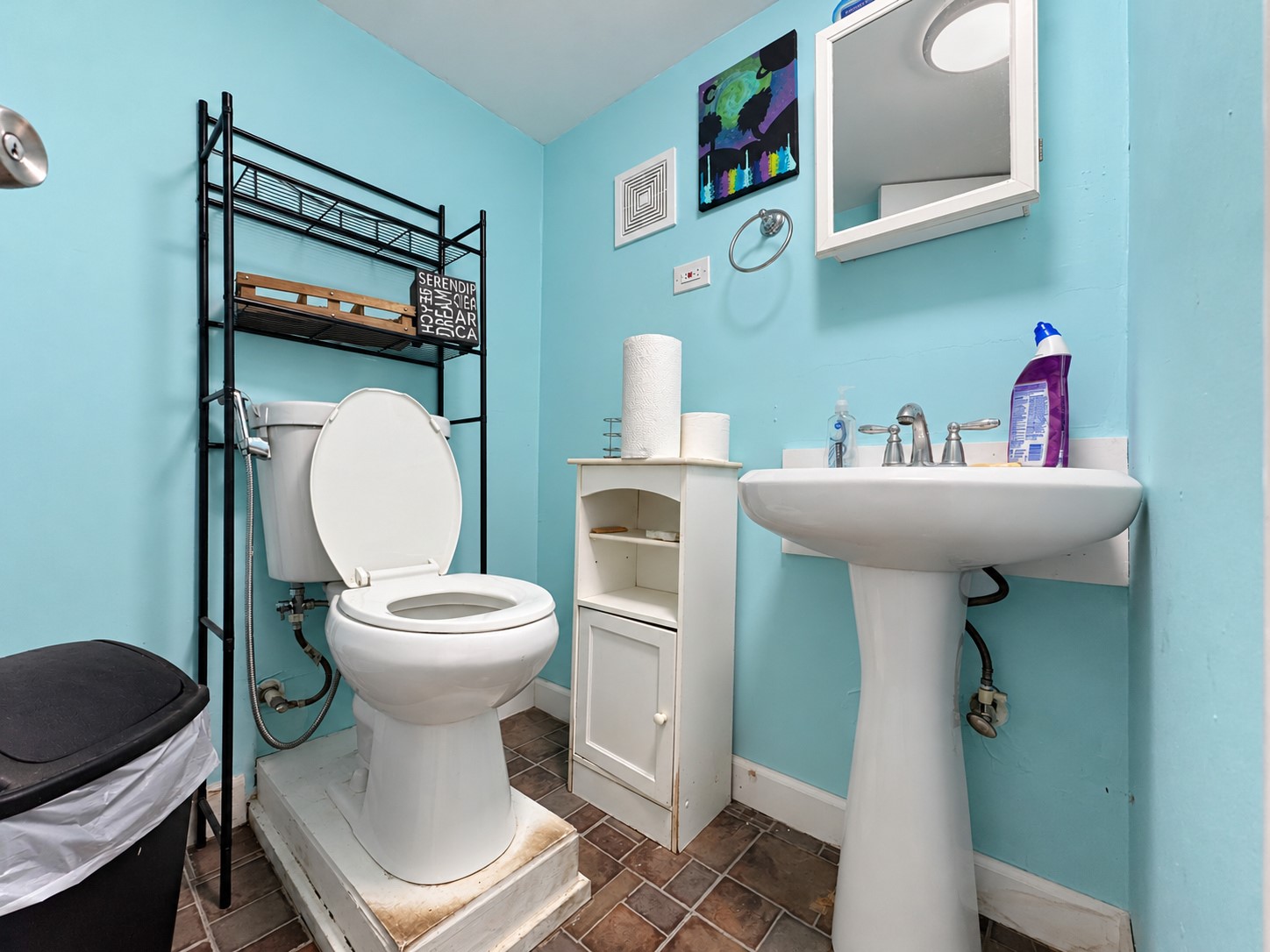 1/2 bathroom off garage