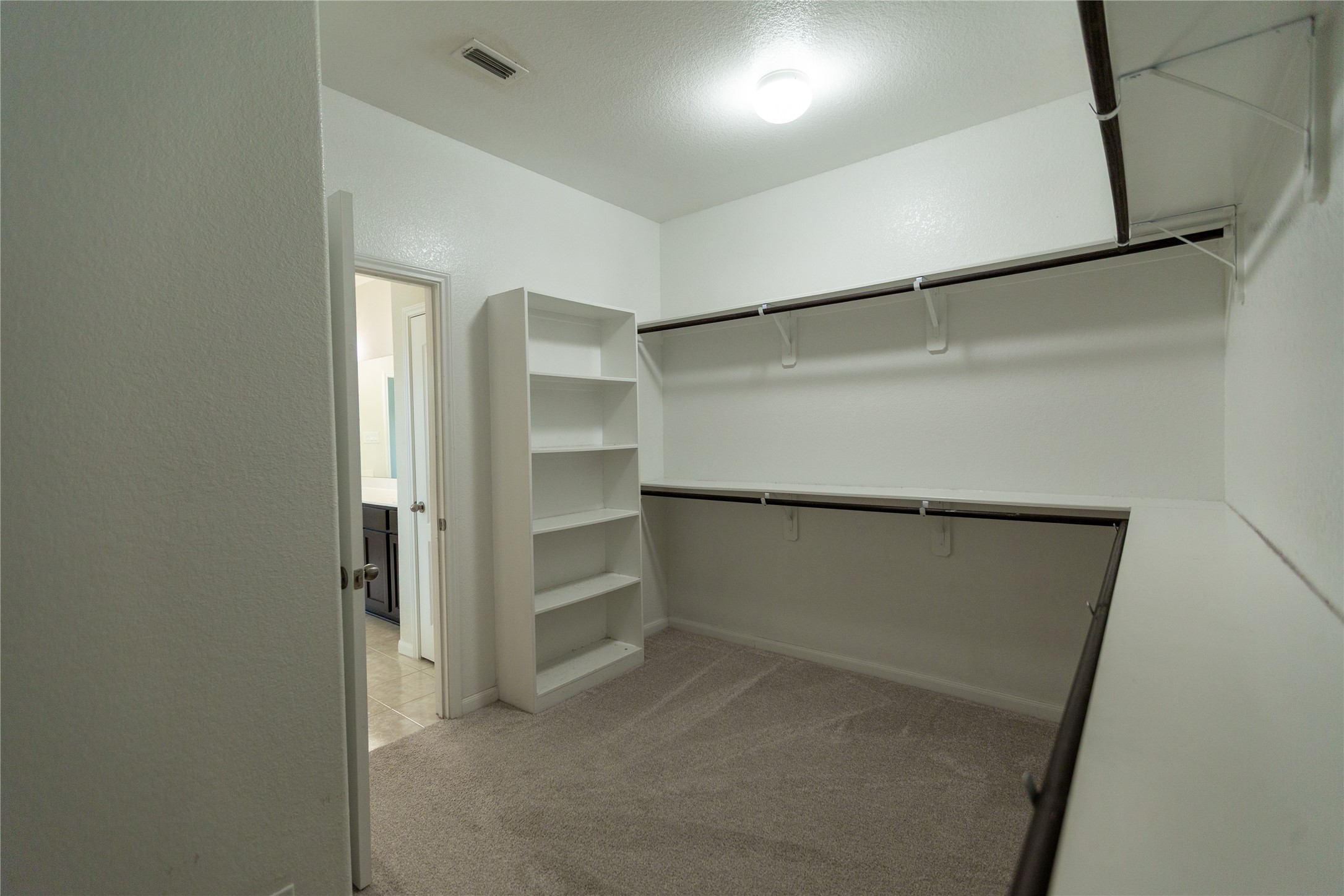 Primary walk-in closet