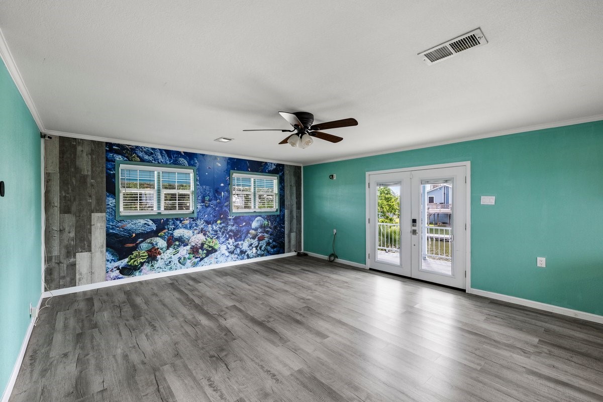 Fish mural could easily be covered with shiplap, if it's not your style.