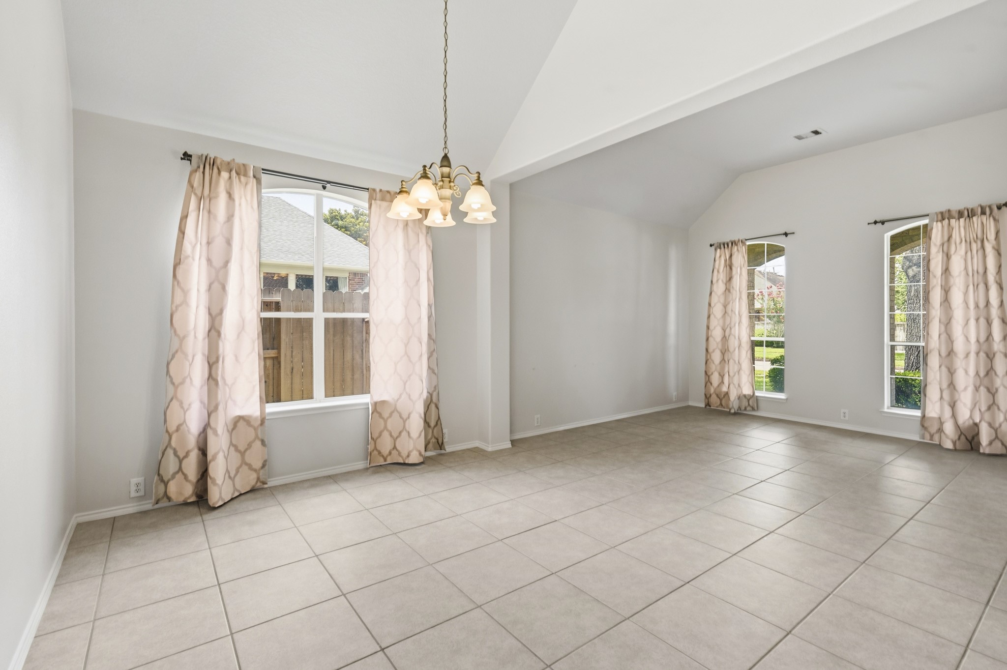 Bright and open formal living and dining spaces, perfect for entertaining guests or hosting special occasions.