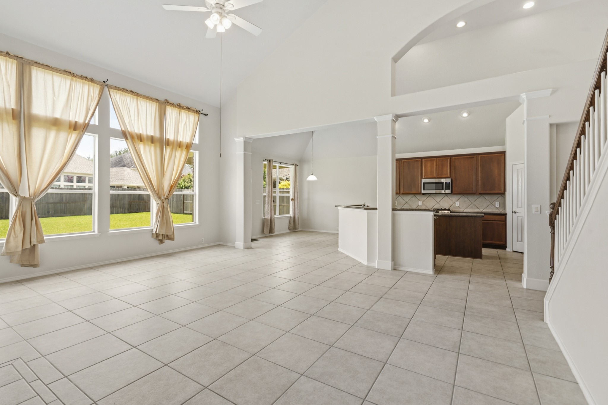 Spacious family room, open kitchen, and sunny breakfast area combine to create the perfect setting for everyday living and entertaining.