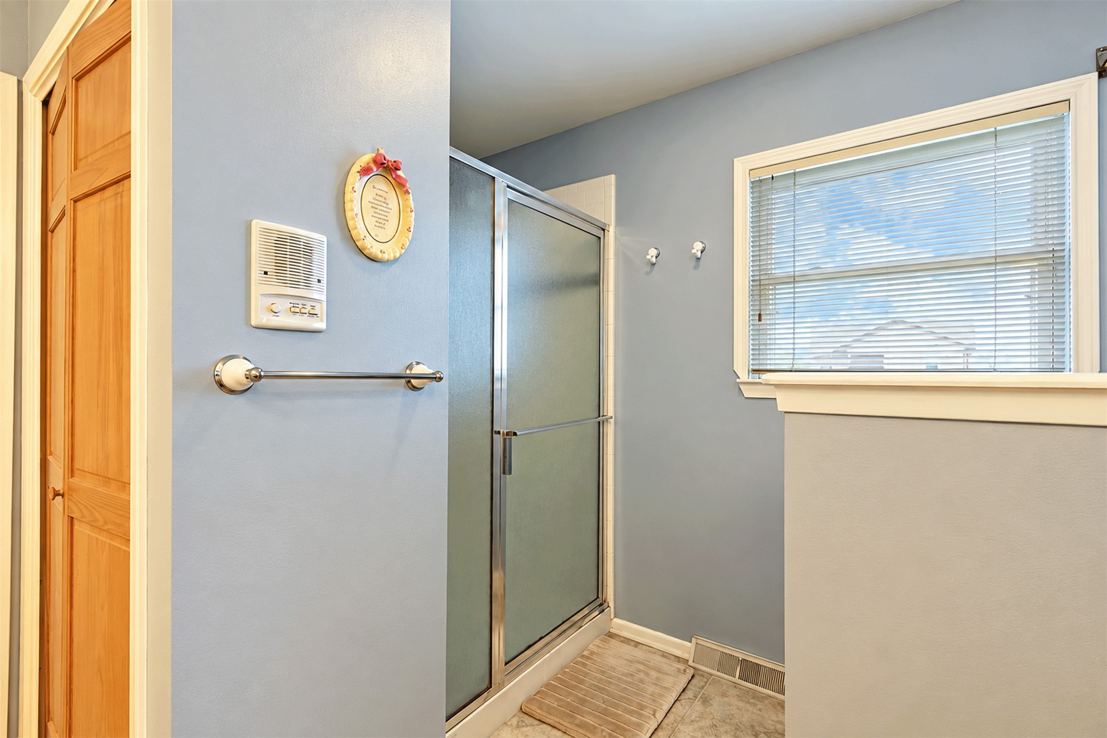 Walk-in shower in the primary bath.